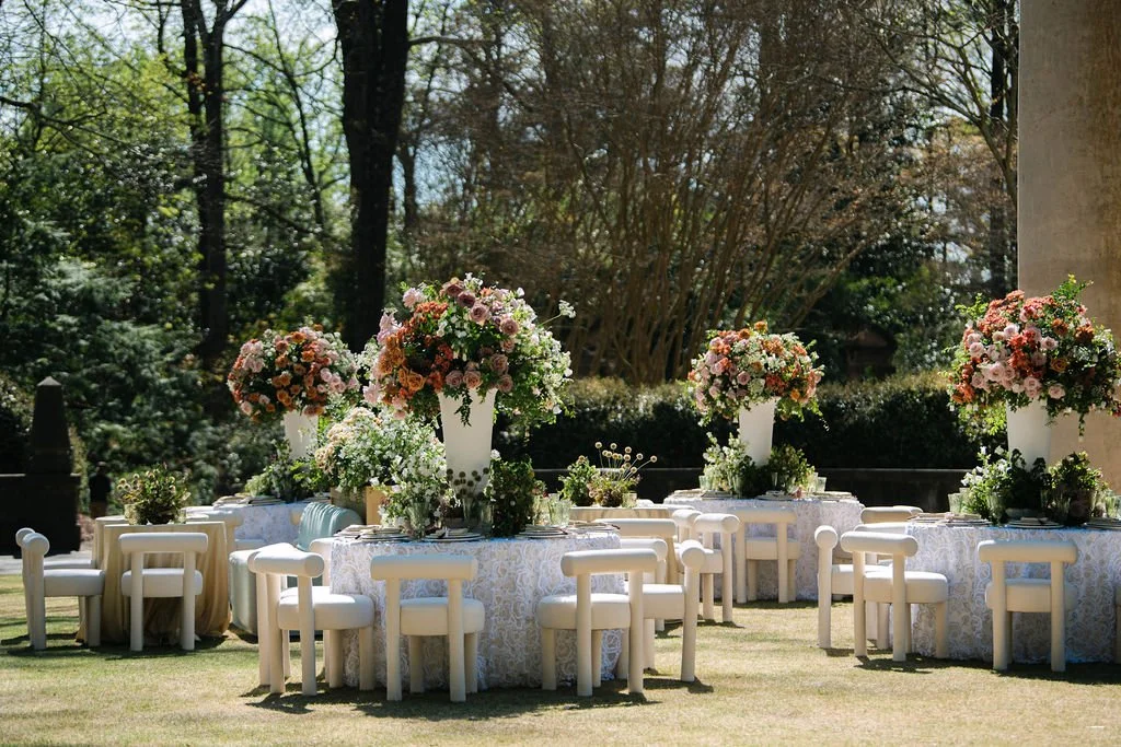 Large antique centerpieces in the grand lawn of the Swan House.