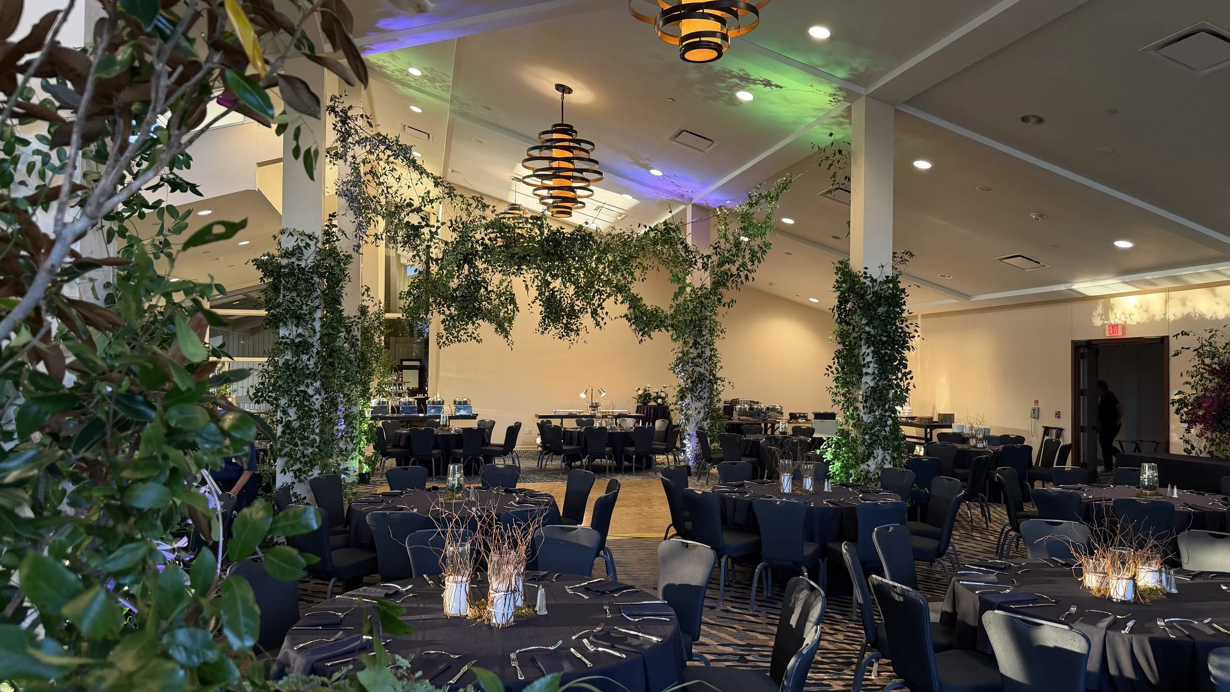 Suspended greenery canopy for a corporate event in The Woodlands