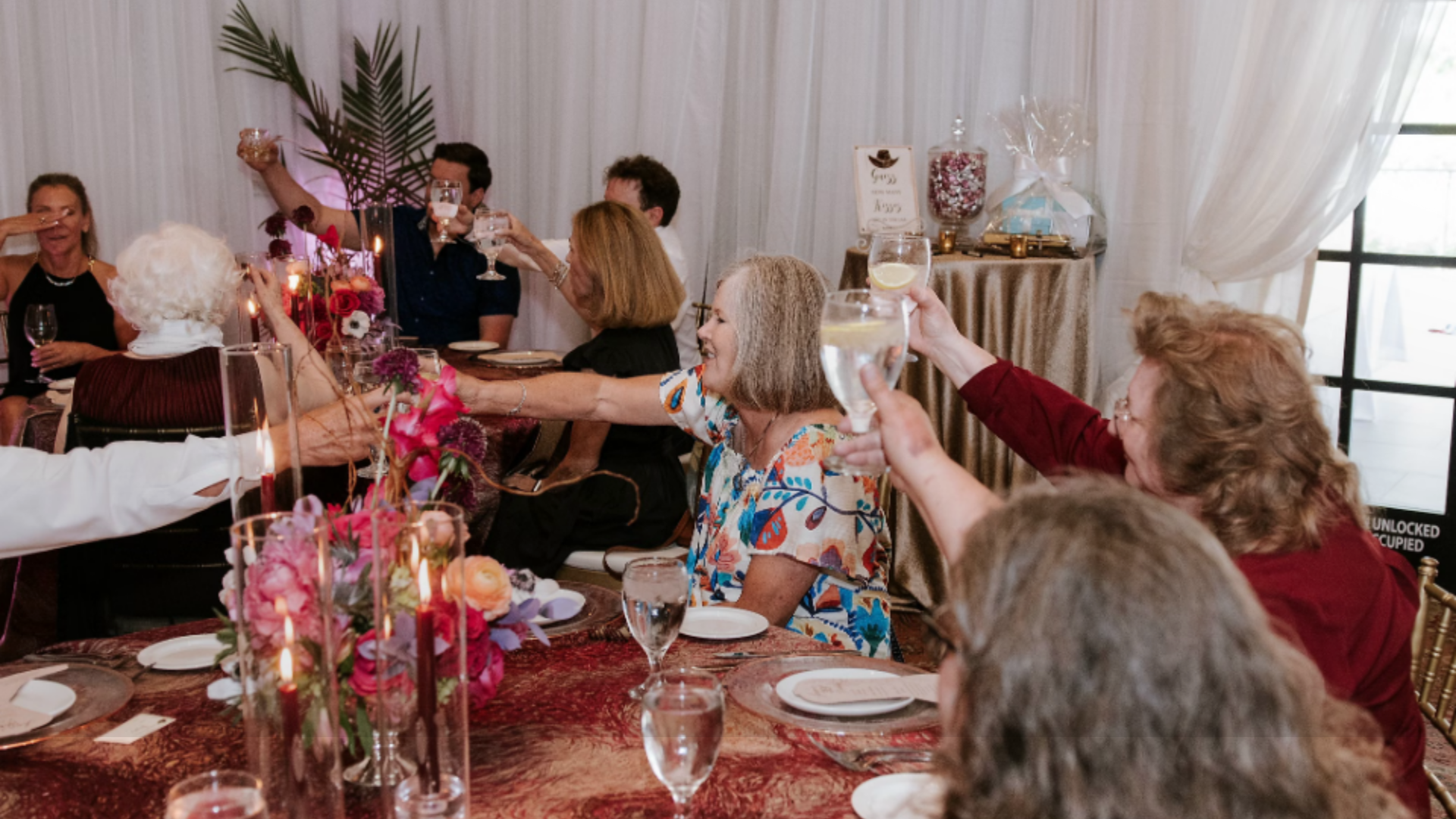 A social gathering in the Woodlands with Fashionable Florist designed centerpieces.
