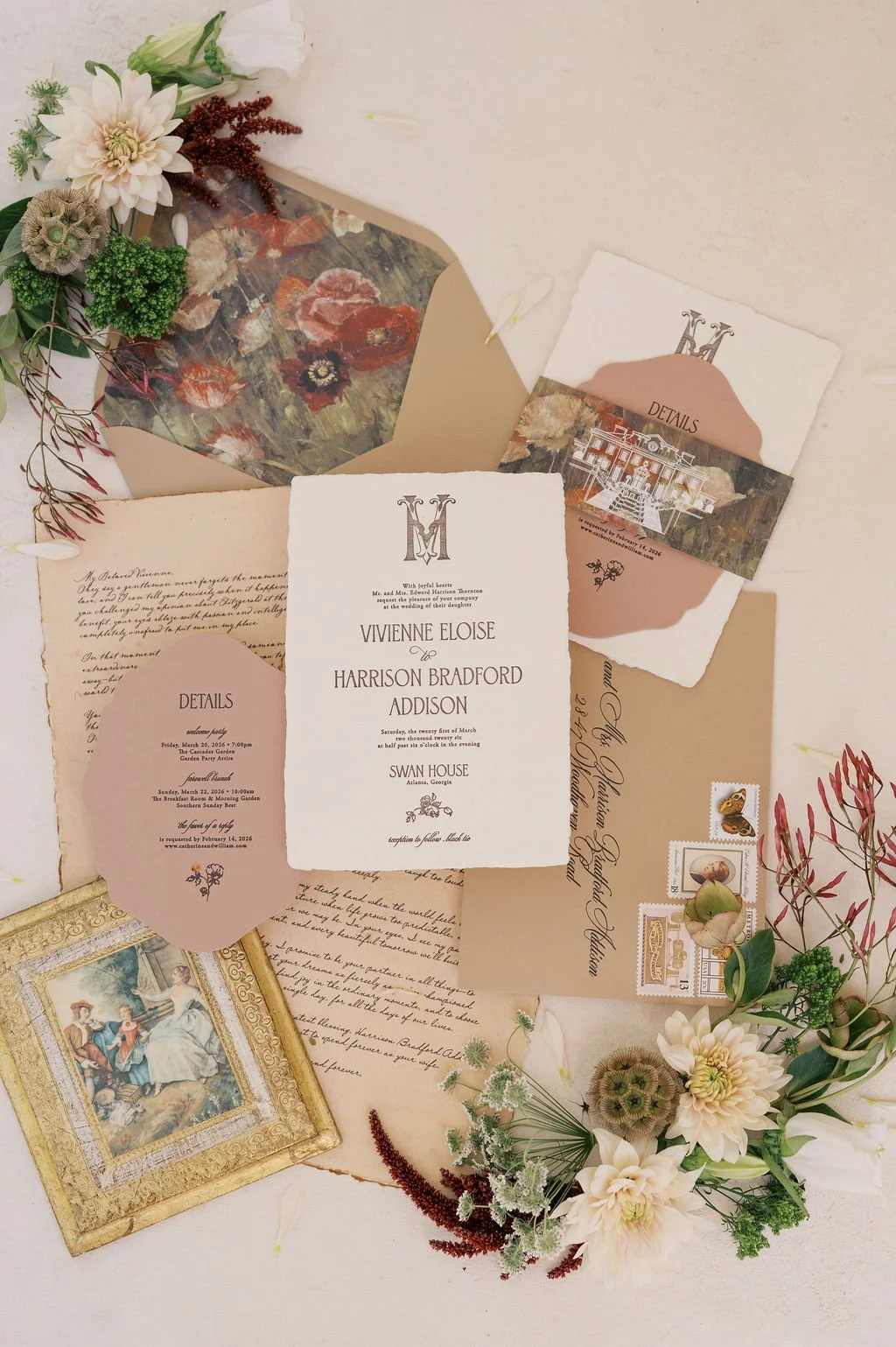 Wedding invitation suite with floral accents, including invites, envelopes, and thank you notes. Includes vintage-style framed artwork and decorative stamps.