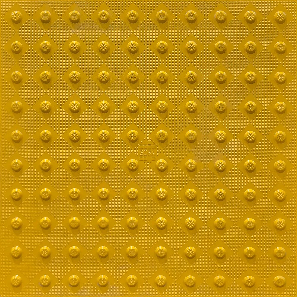 Product close-up of the GORA 24x24" (610x610mm) safety yellow fiberglass tactile plate.