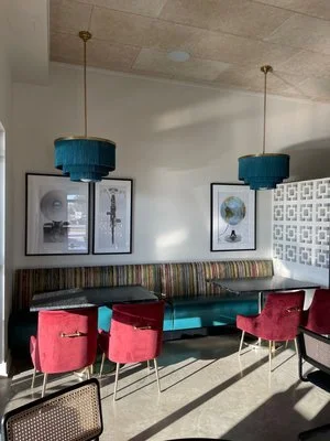 Comfortable Seating. Accessible. available booths. Stylish decor. cute atmosphere. photo worthy. Tables for large parties. call in reservations. call ahead. google and yelp reservations. natural lighting. secluded tables. Great study spot.