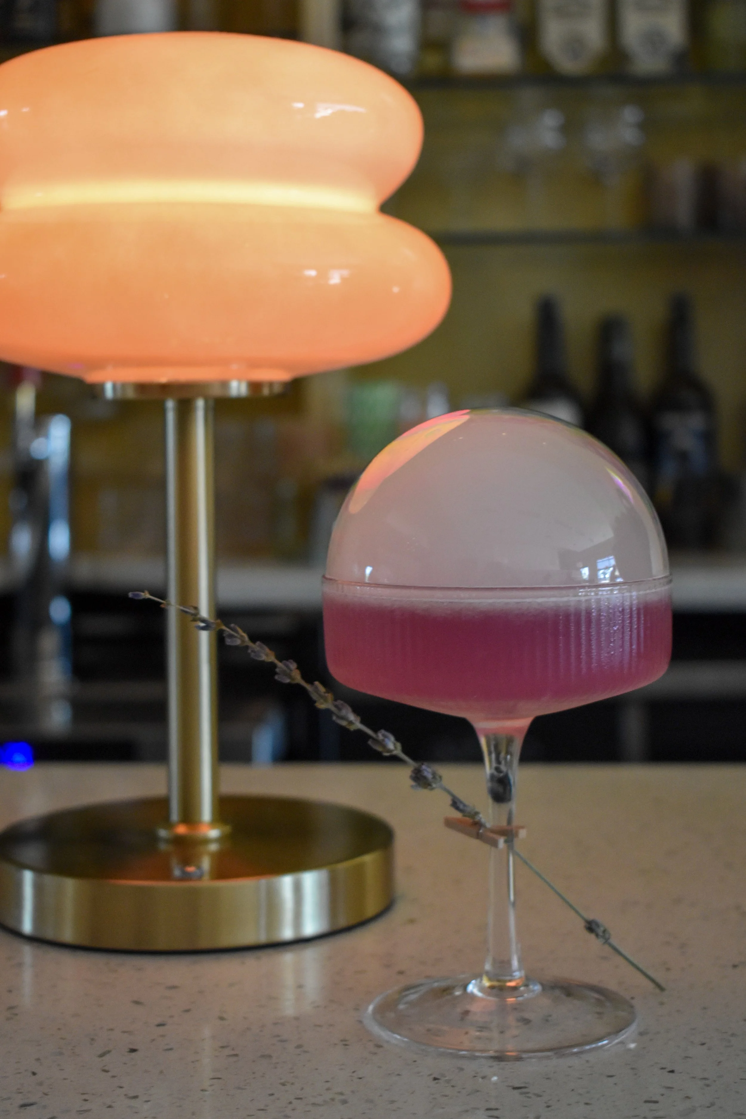 Catchy Cocktails. Fresh squeezed juices. Instagram ready, photo worthy cocktails. Lavender Haze. Lavender Martini. Great happy hour. Unique Cocktails. Moody Bar. Great place to have drinks with friends. Date night.