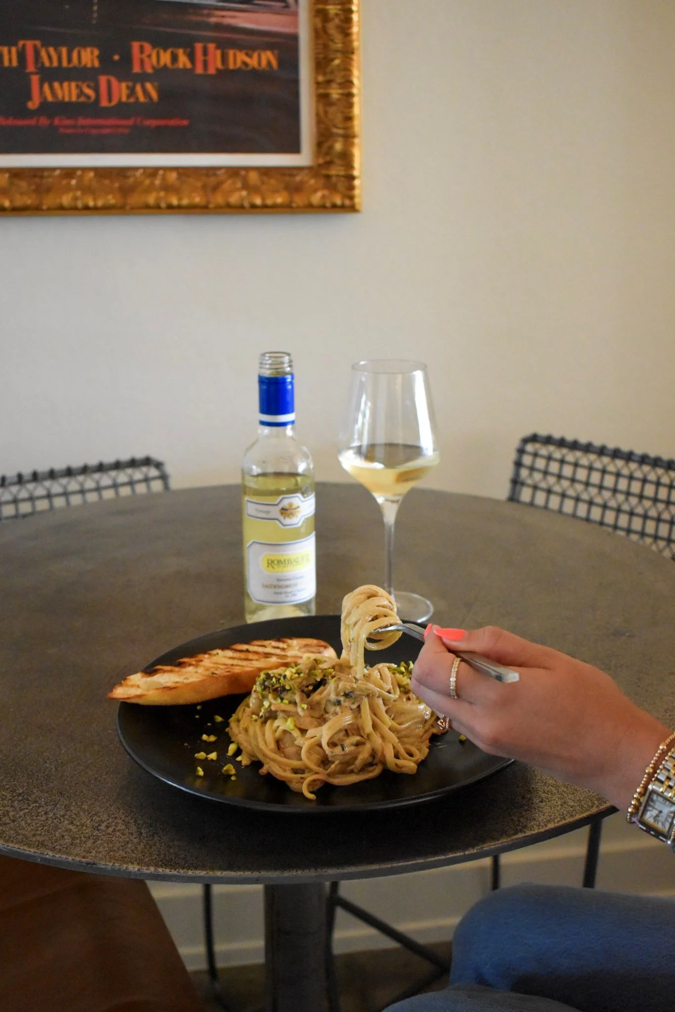 Smoked Duck linguini with pistachios, dried cherries, and shallots. grilled french bread. Nice large half bottle wine selection. Trendy bar environment. Great unique pastas