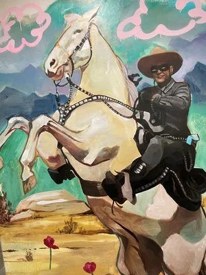 Western mural painting. cool art of a cowboy. large restroom. sanitary restrooms. baby changing table. accessible restrooms. restrooms are never dirty. kitchy decor. family restrooms. Jon McKenzie Varsity Walls Austin Texas Murals
