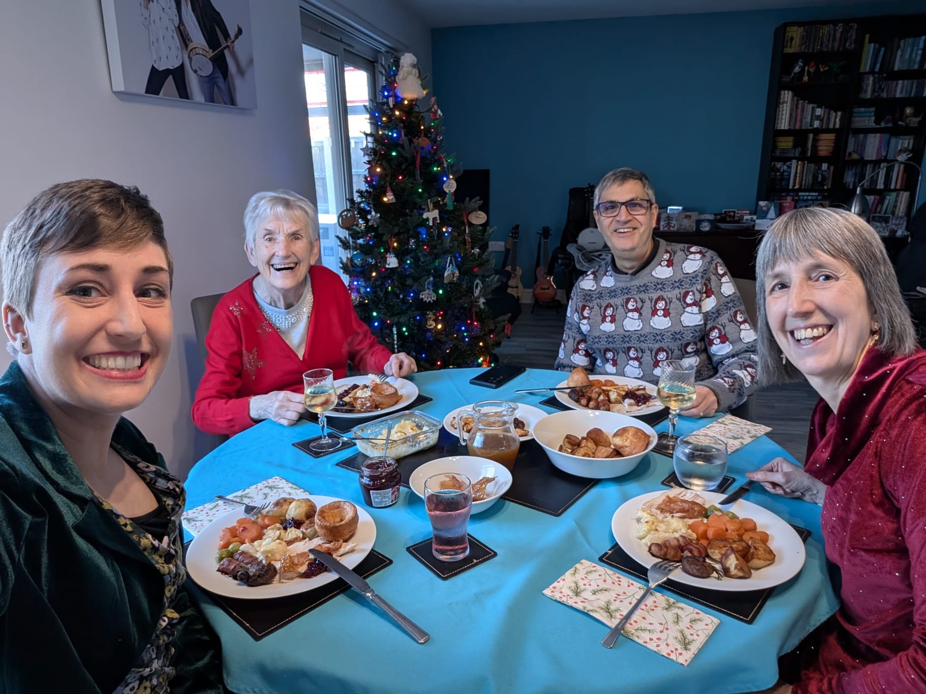 Jen, her parents and her nan, sitting around the table having Christmas Dinner