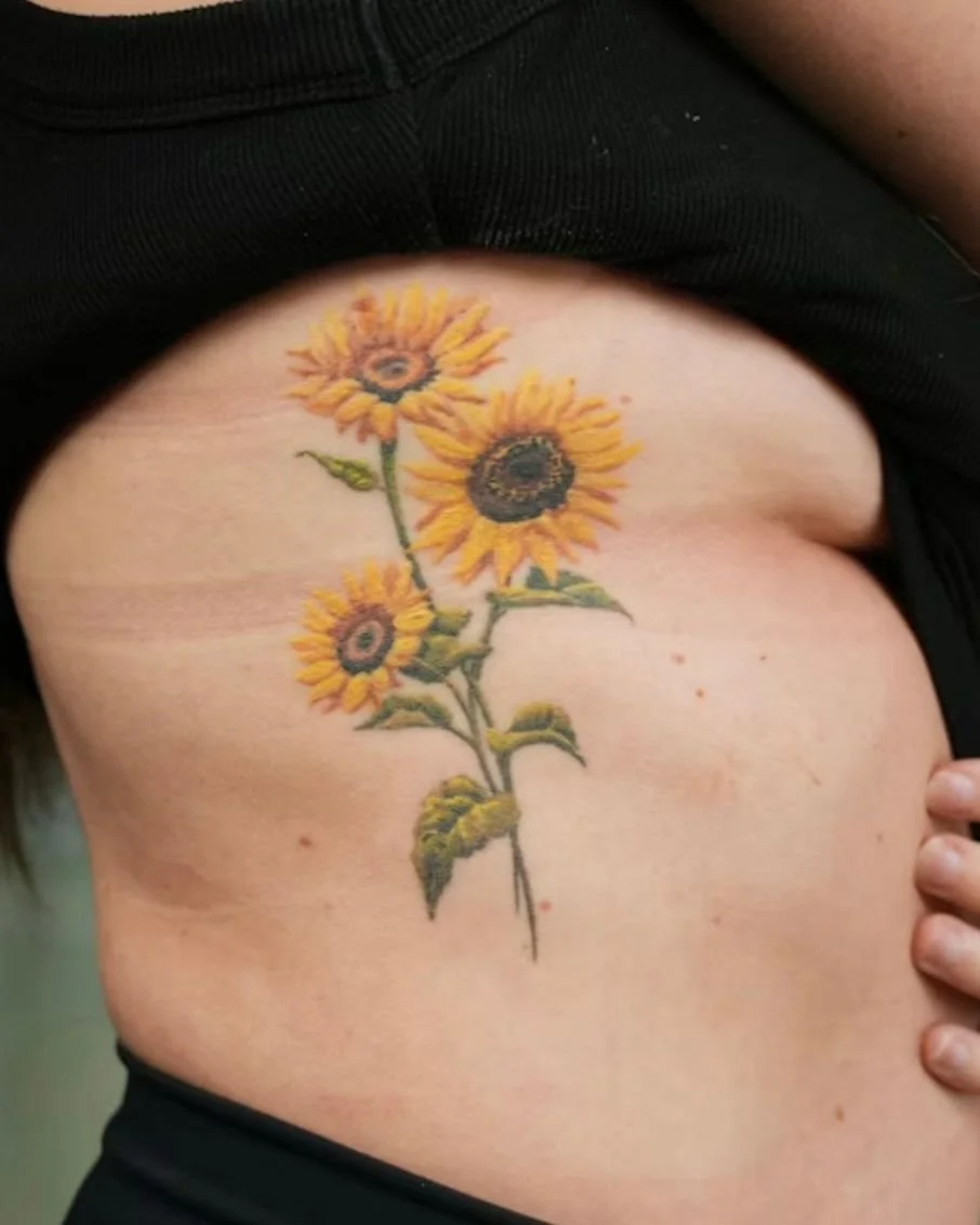 &ldquo;I love sunflowers, something dainty and feminine but full of detail&rdquo;🌻

And that&rsquo;s what she got! We used the stems to create an elegant elongation of the design, complementing her torso😊

Even after a few years healed her sunflowe