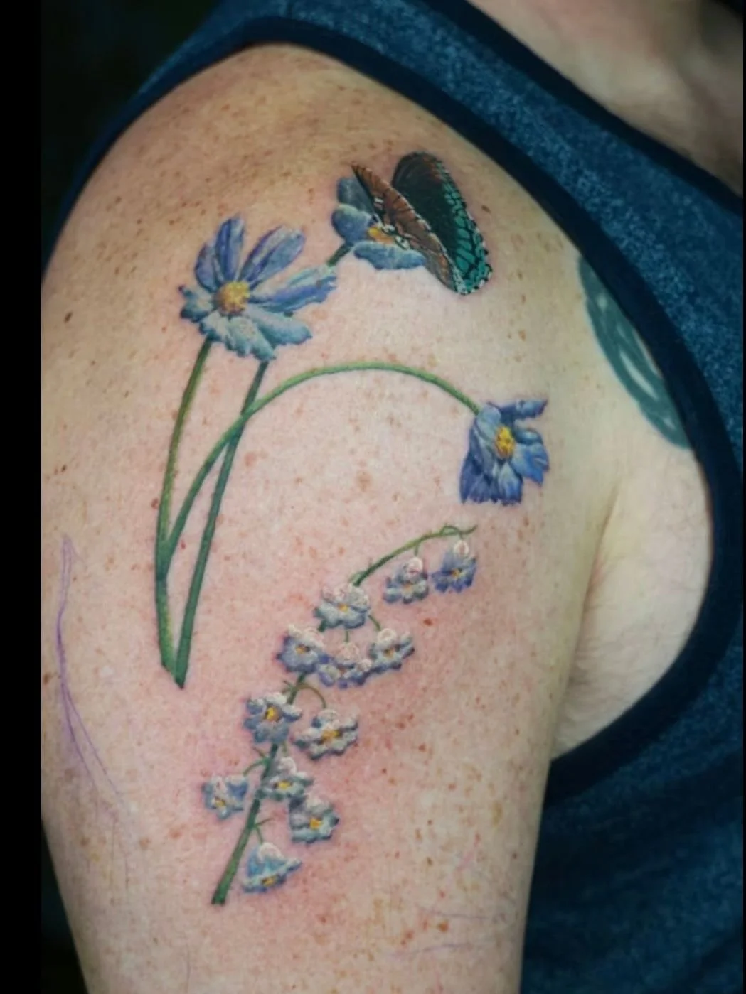 Deran drove from North Carolina for this.

A dense wild entanglement of garden plants and wildflowers filling his upper arm. We are just getting started. Leaves, insects, and more still to come as we build out the full three quarter sleeve.

Some pie