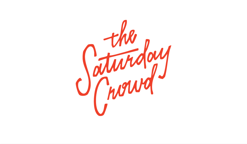 Logo for the 'Saturday Crowd' in red cursive on a black background.