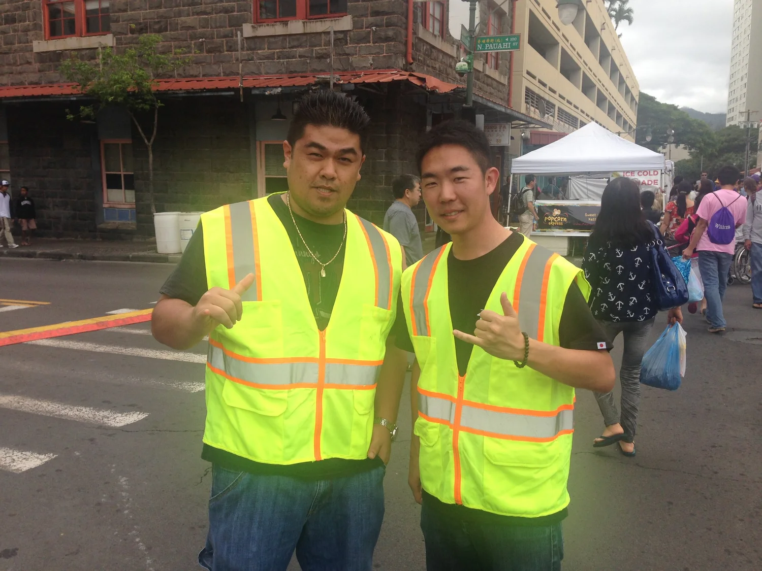 2015 JCI Honolulu President and JCI Senator Tyler Hiranaka with 2018 President Paul Song volunteering at Night in Chinatown in February 2015.