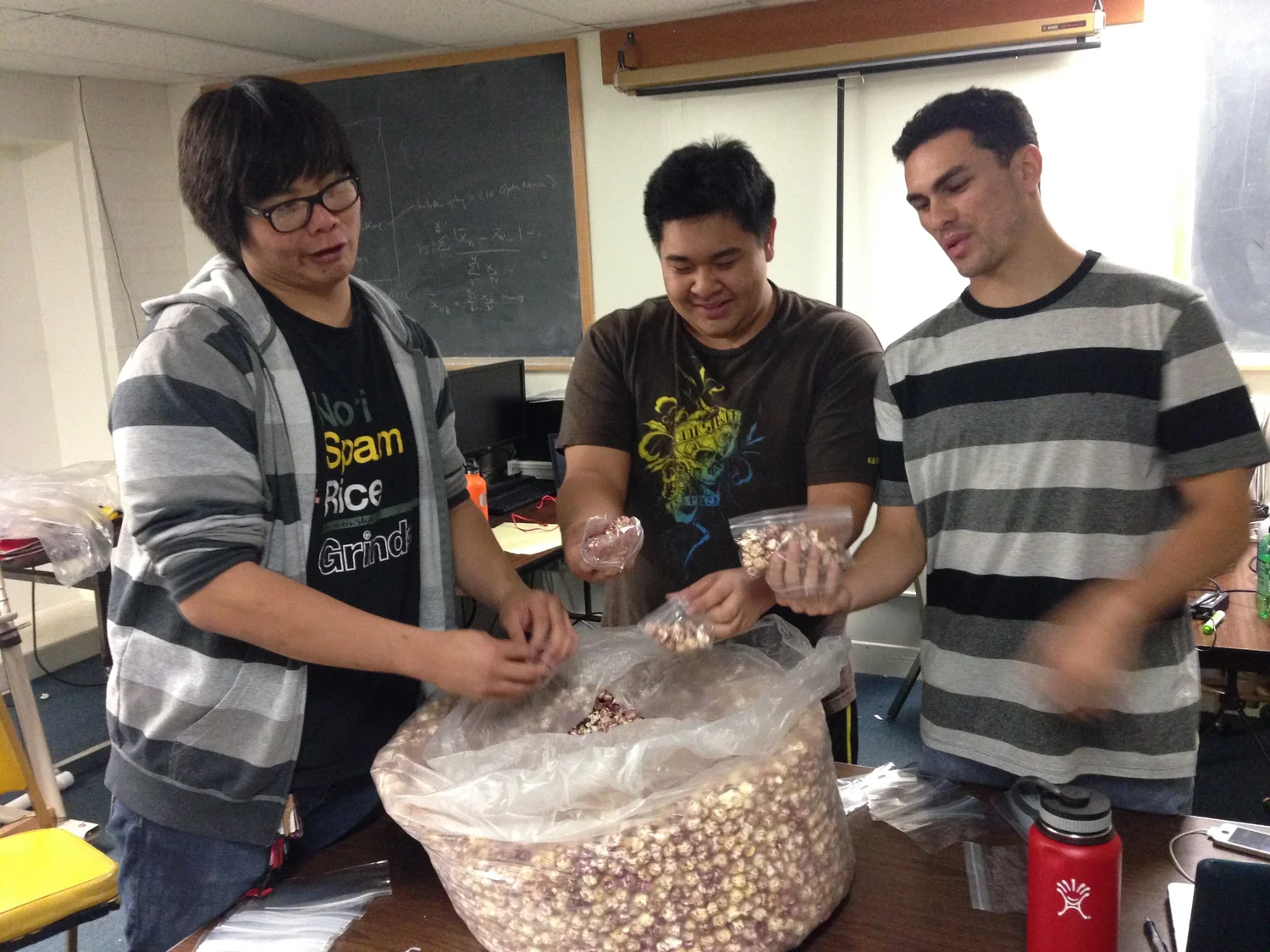 Asian American Jaycees members packing popcorn snacks for Relay For Life in 2015.