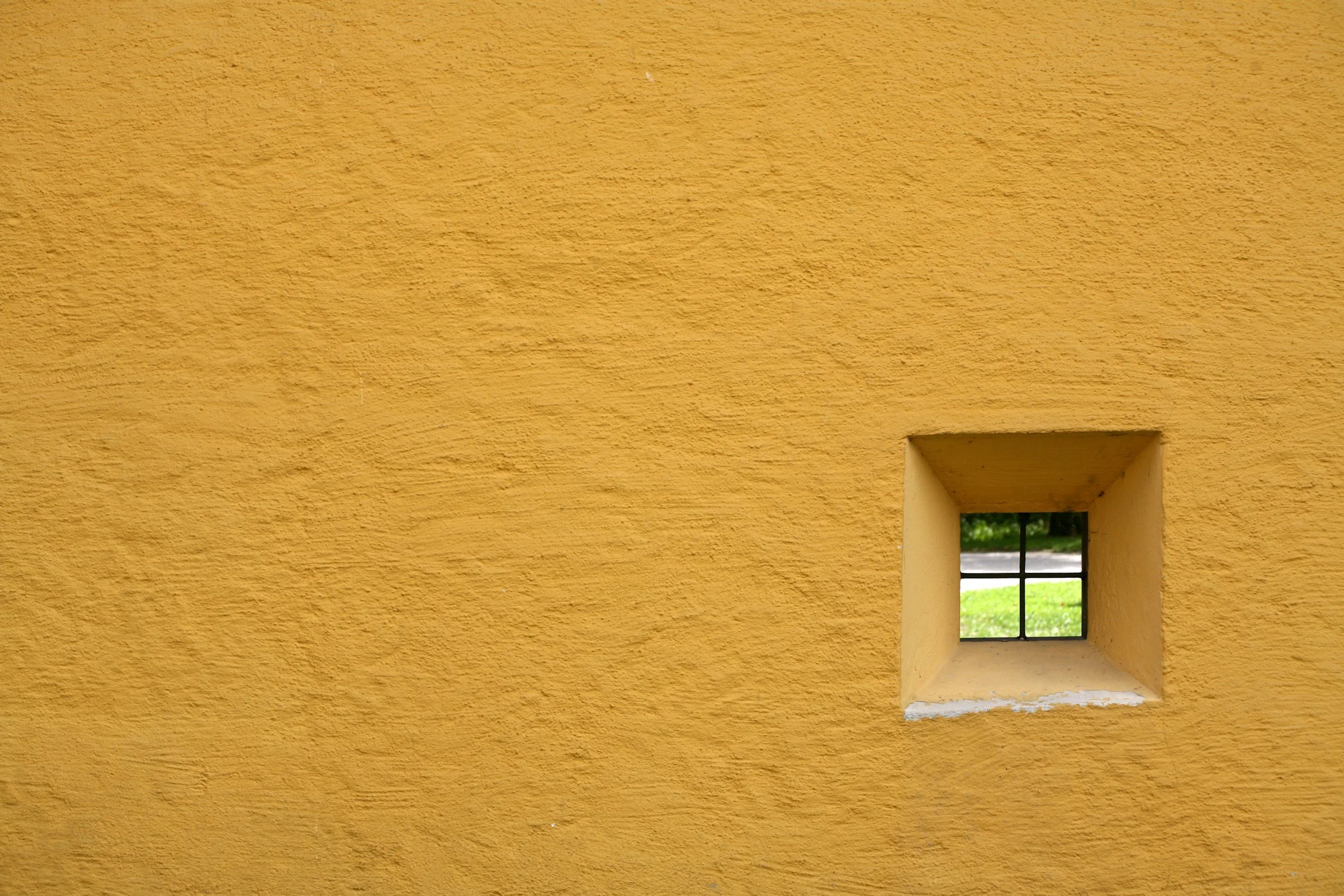 Group of four peopleSmall window in a yellow wall.  Increase your window of tolerance, with support from an Maryland anxiety counselor.  Effective anxiety therapy helps you learn to relax your nervous system and body.