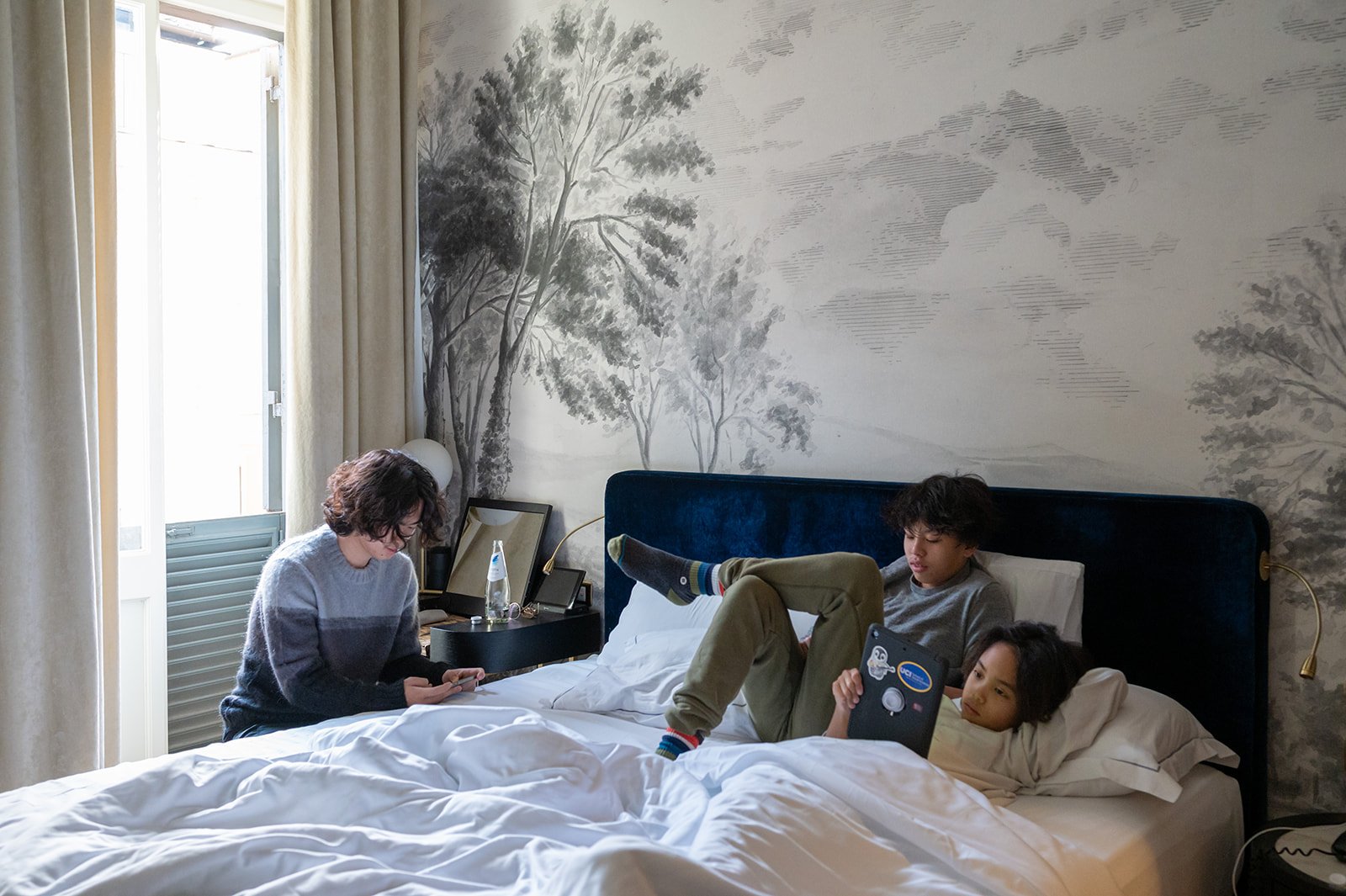 family vacation reportage -teens playing in their room.jpg