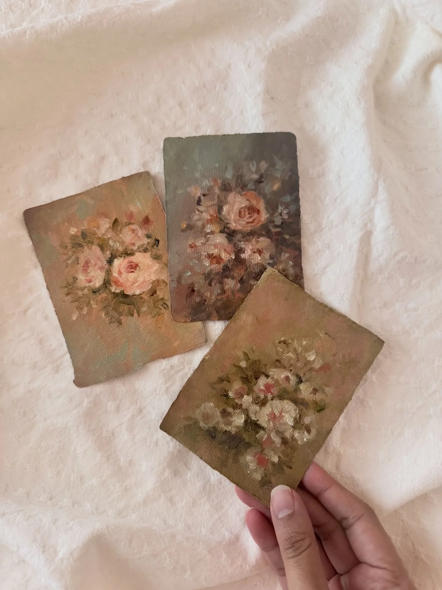 These three little florals have now gone to their forever homes.

I sat with them for a long time before releasing them. They are small in scale. Each one carries the weight of oil, layers built slowly, adjusted, softened, deepened until the bouquet 