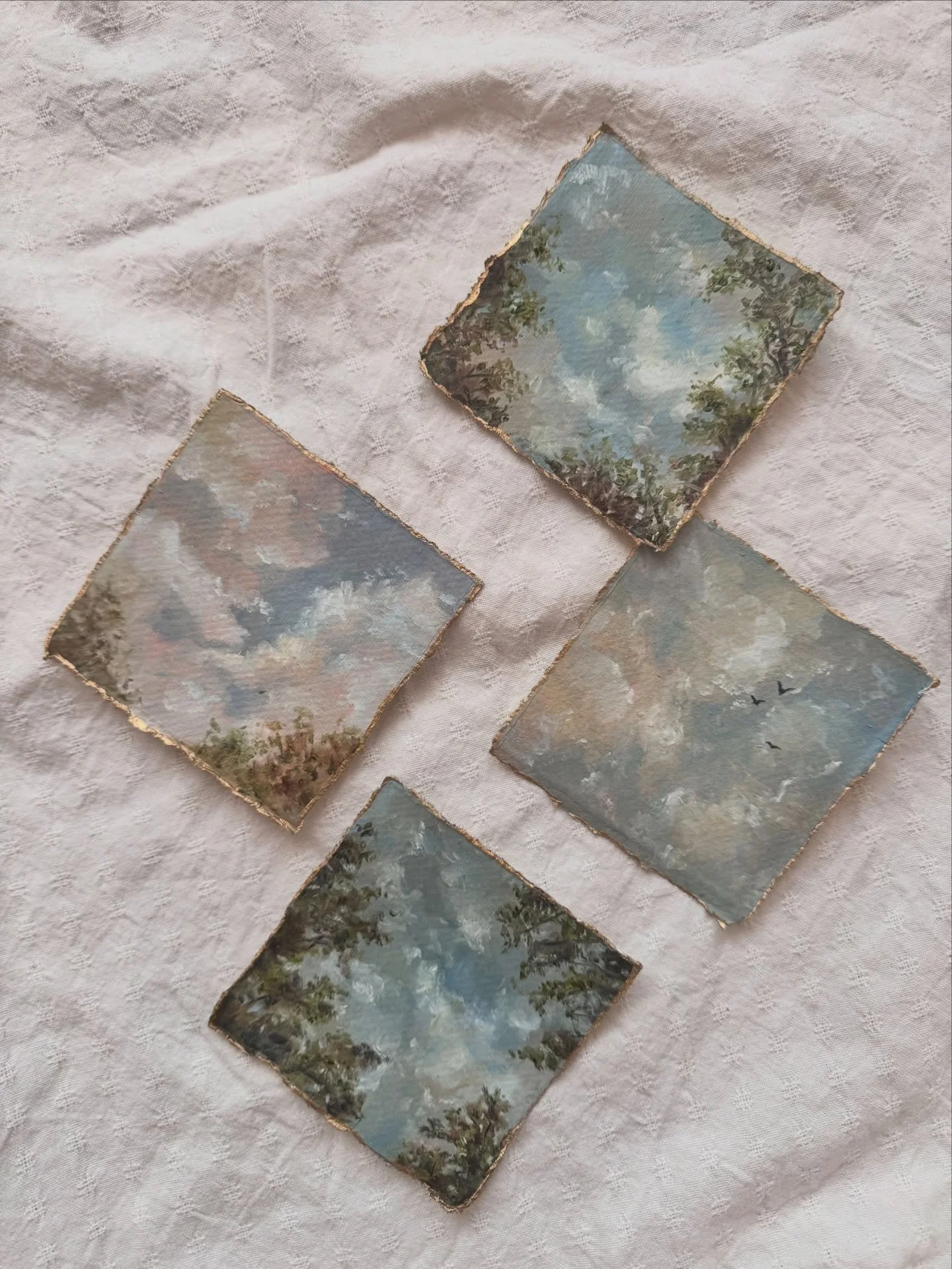 I&rsquo;ve been thinking about the moments when we instinctively look up because something in us needs space.

The sky has a way of holding that.

These small paintings began there
in those quiet pauses when the world feels a little too full,
and the
