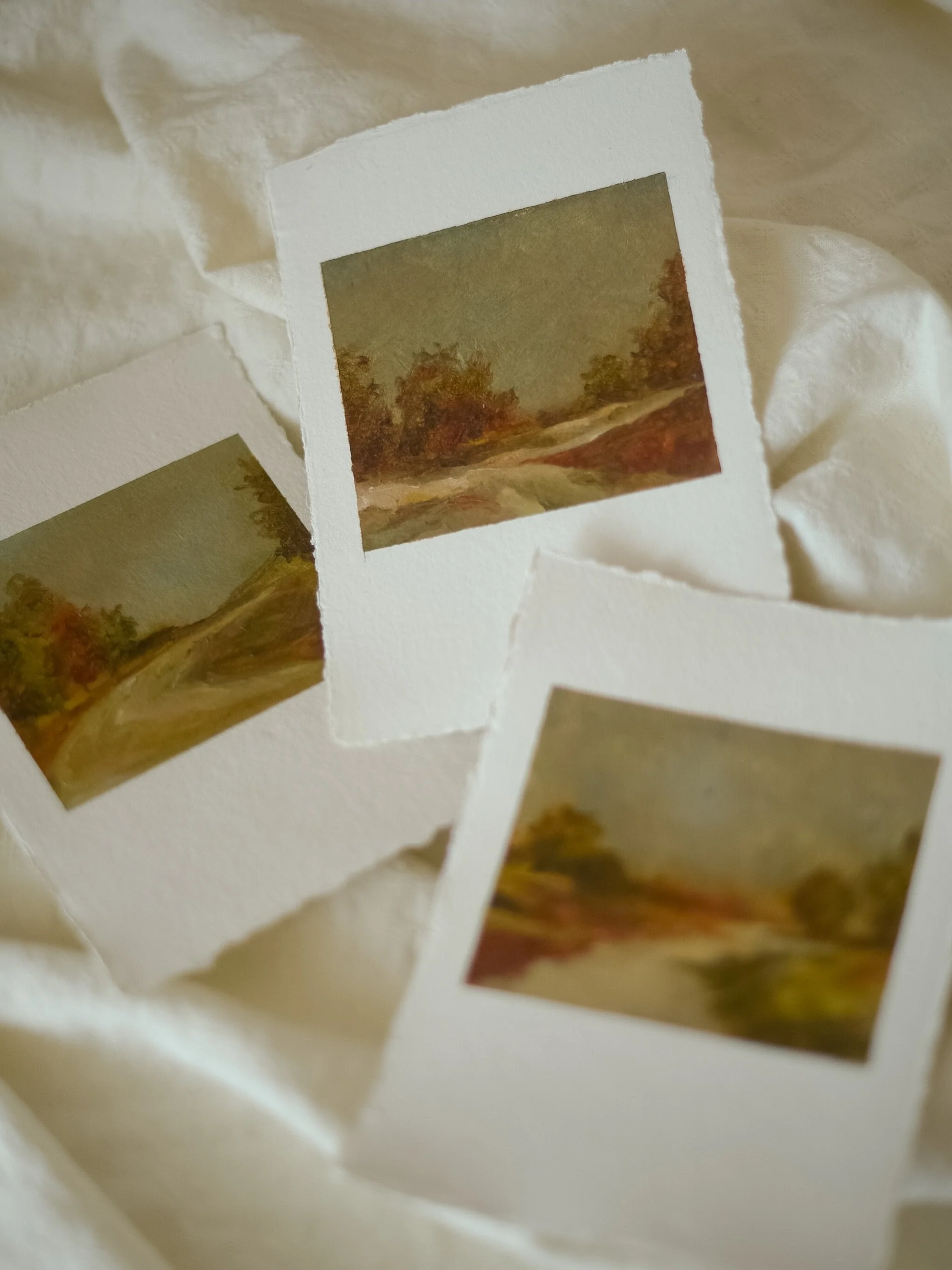 One of my favourite parts of working on a collection is reaching the point where I can finally lay all the paintings out together.
For weeks, I see them one at a time on my table. 

Then I place them side by side and begin to notice the thread runnin