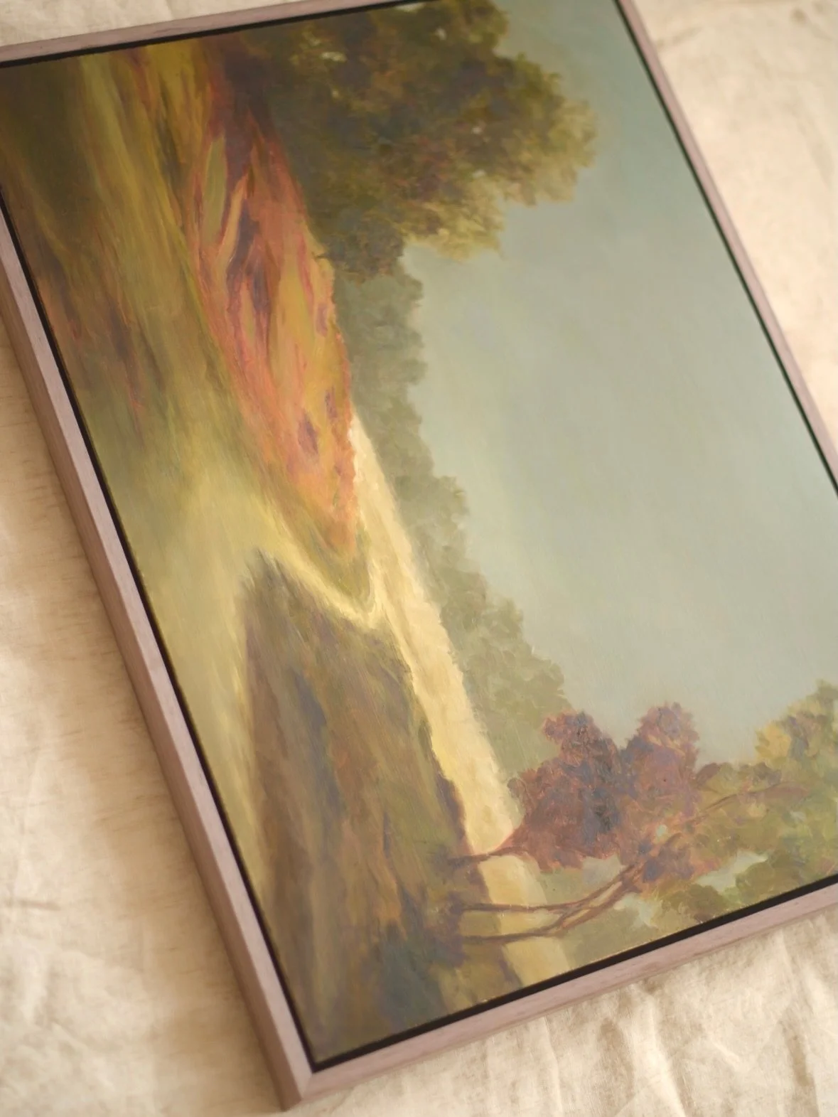 A closer look at The Long Way.

Some details only reveal themselves as the light moves across a painting. The metallic gold along the path settles quietly into the landscape, then begins to glow when viewed from a different angle.

I love how the fra