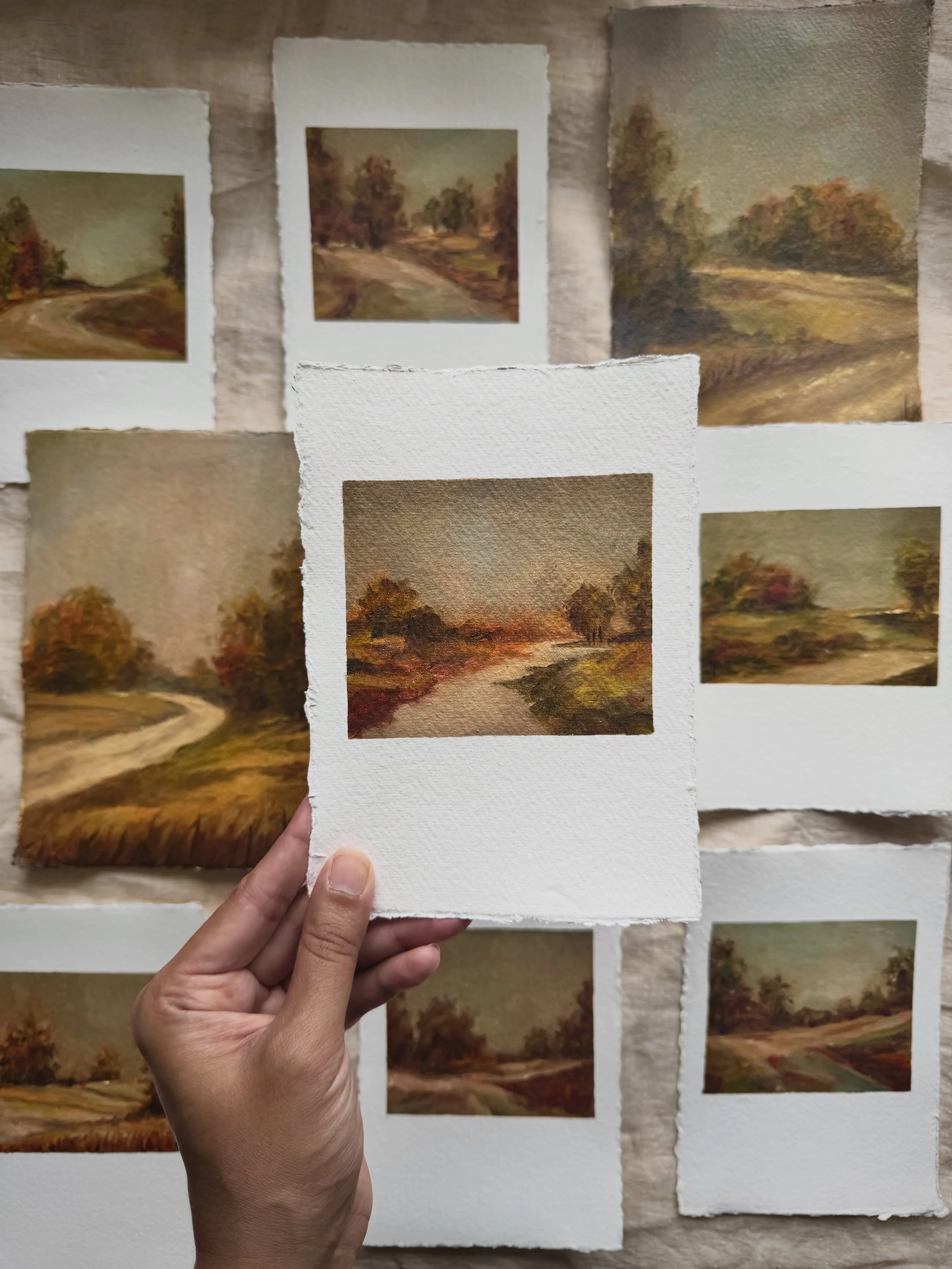 There is something about the little road disappearing into the distance that feels like the whole collection to me, that quiet pull towards somewhere familiar, even when you cannot quite see where it leads.

I painted these landscapes thinking about 