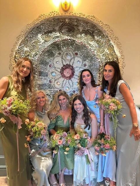 bridesmaids holding bouquets