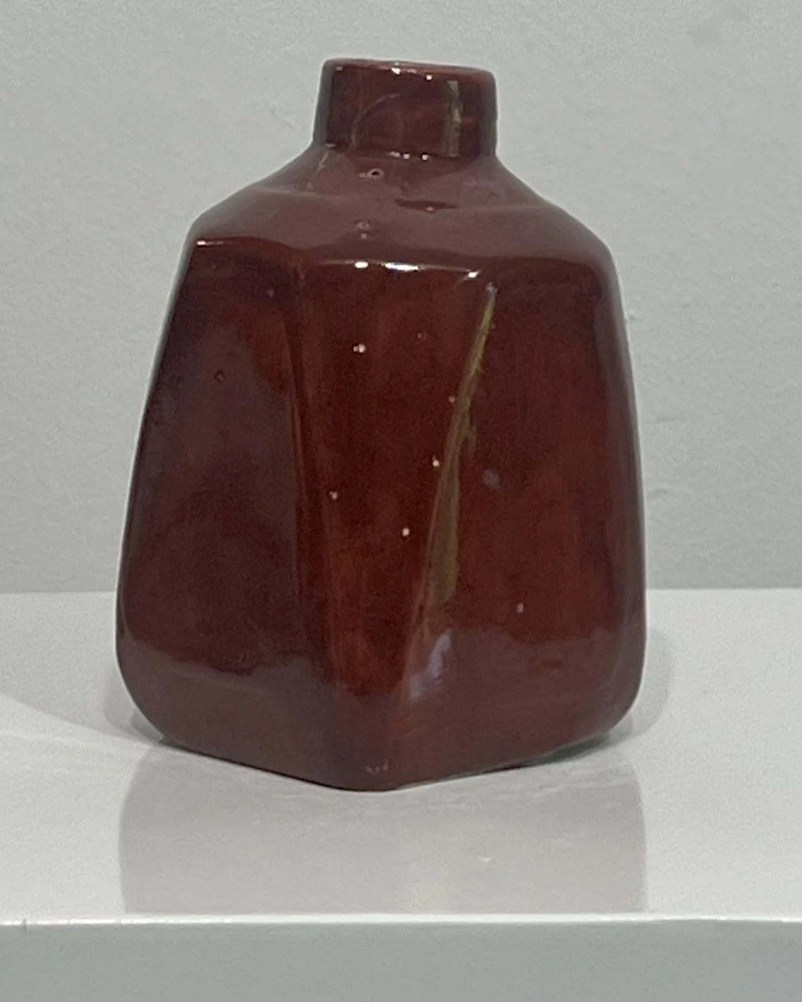 26.51 Deep Firebrick porcelain milk jug vase, left side view