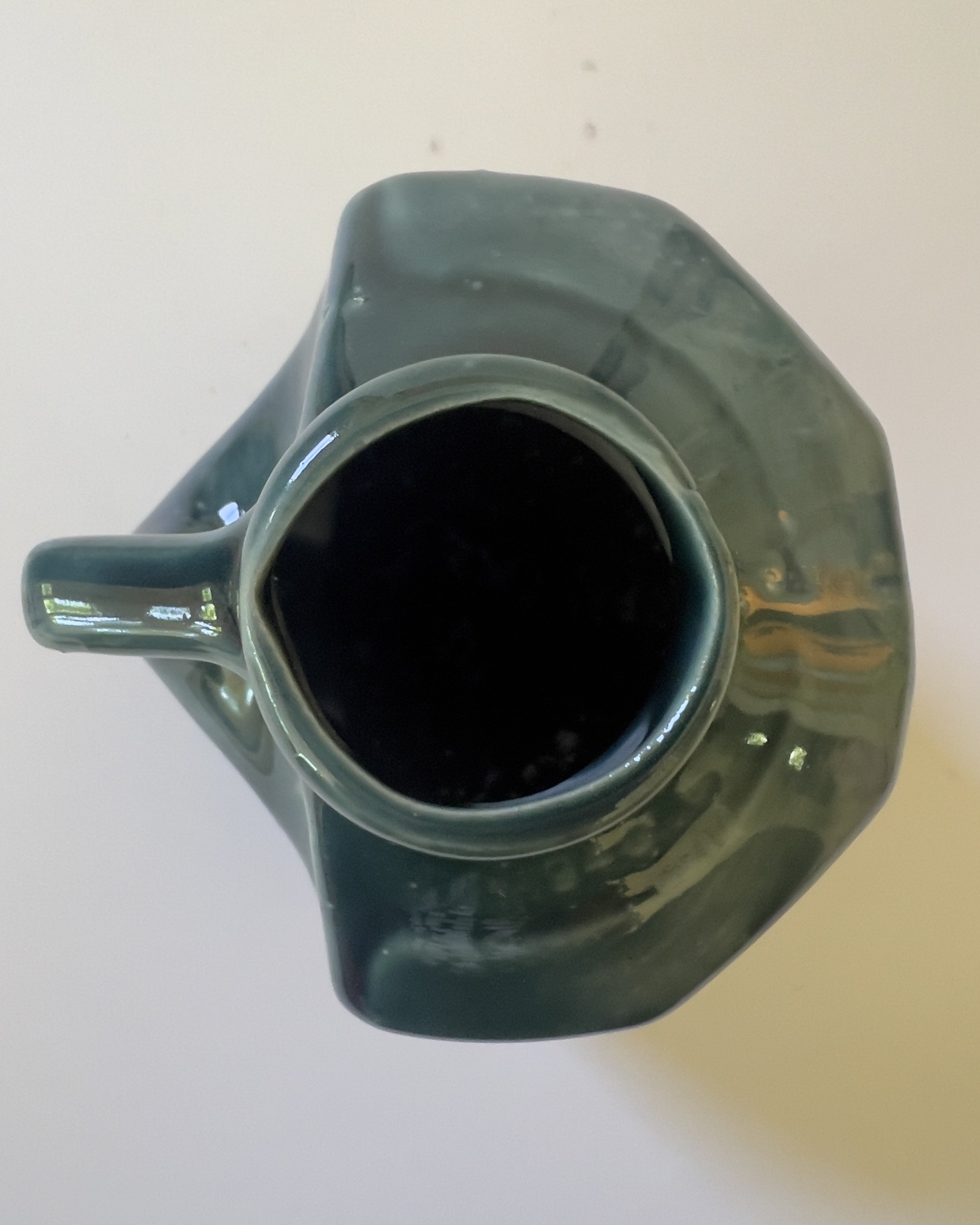 Top view of handmade ceramic jug vase showing sculptural opening