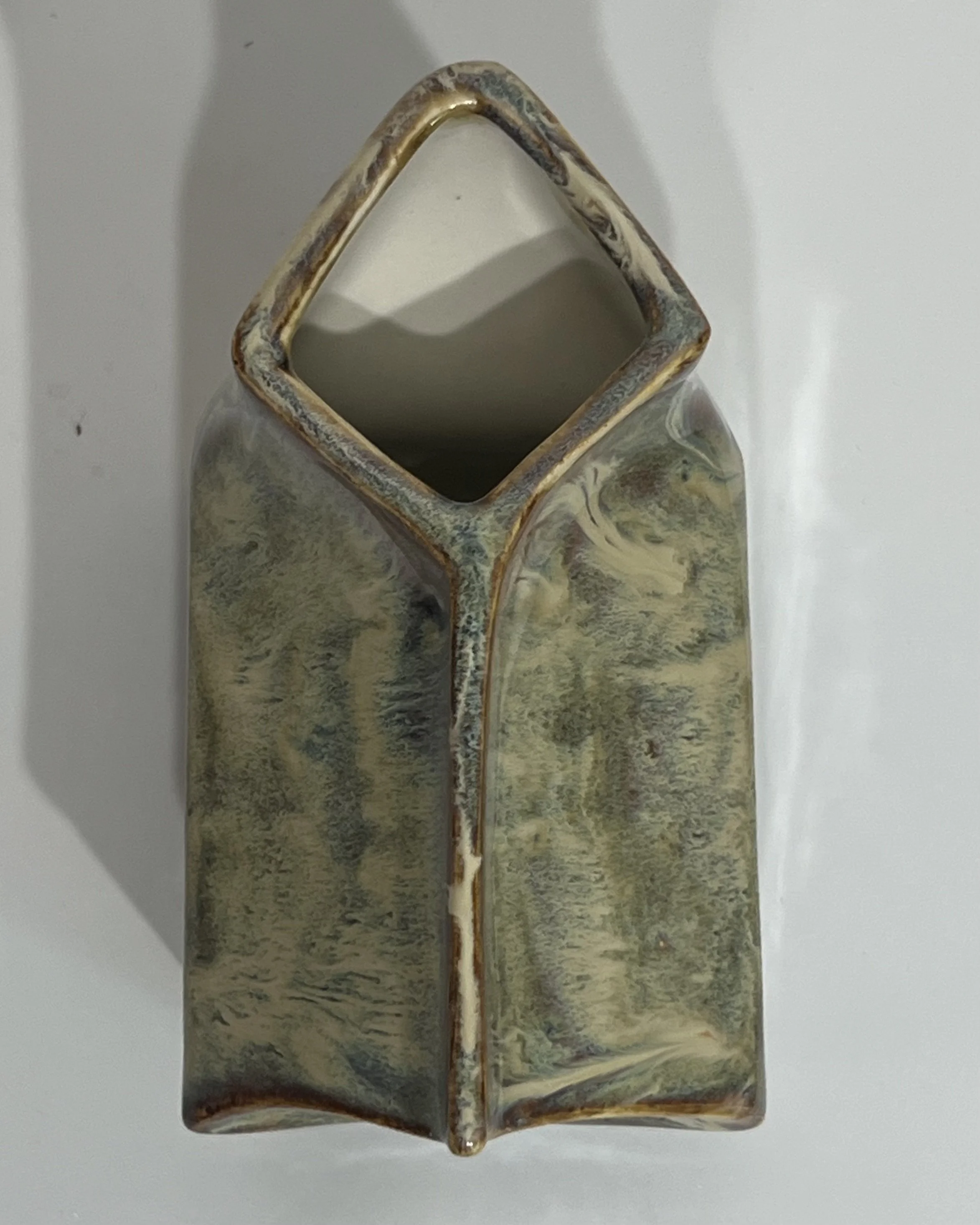 Top opening and folded form of porcelain milk carton vase