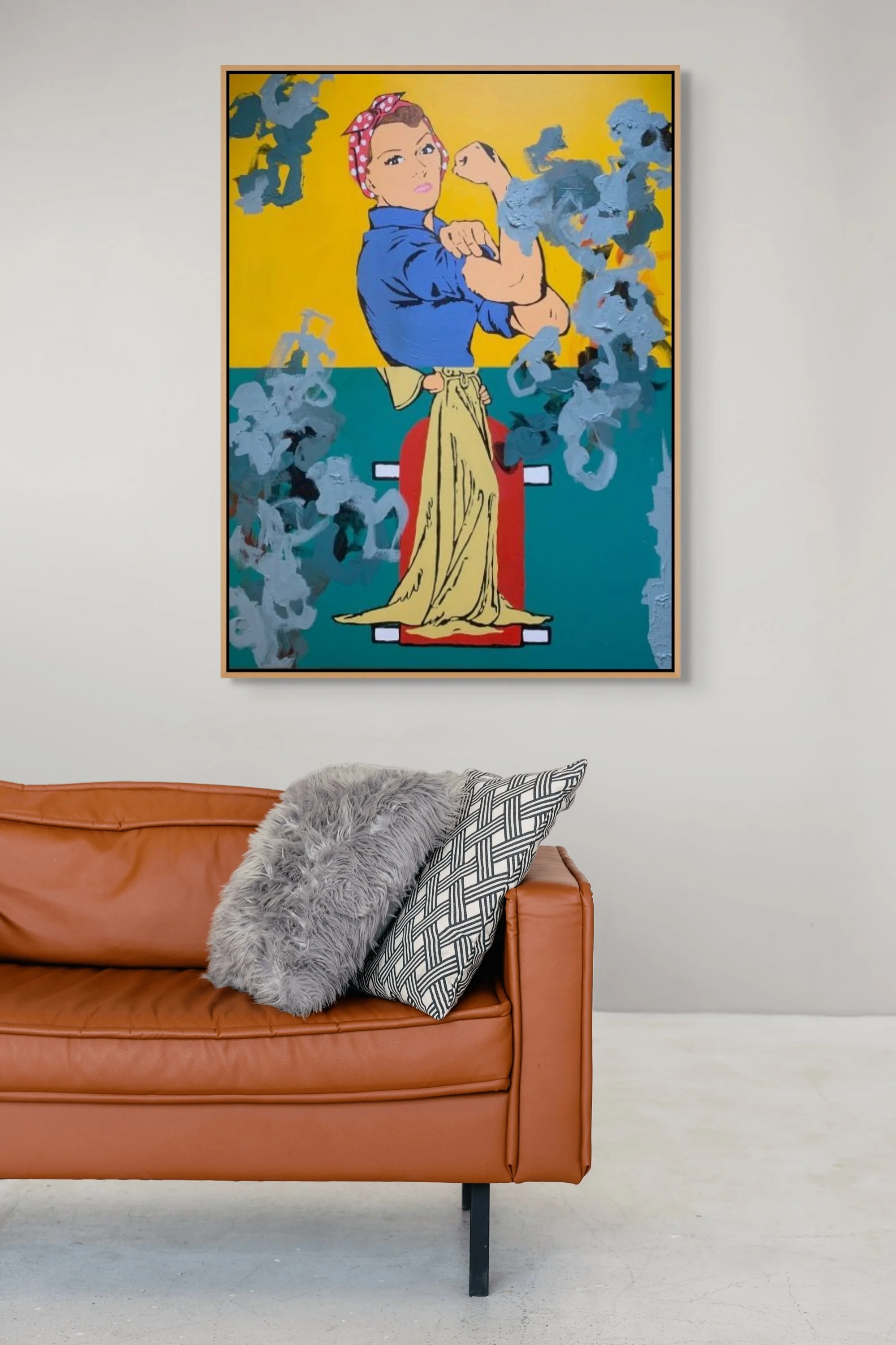 Sliding Scale, a colorful 40 by 30 inch original feminist painting by Alissa Van Atta, displayed above a sofa in a modern living room.