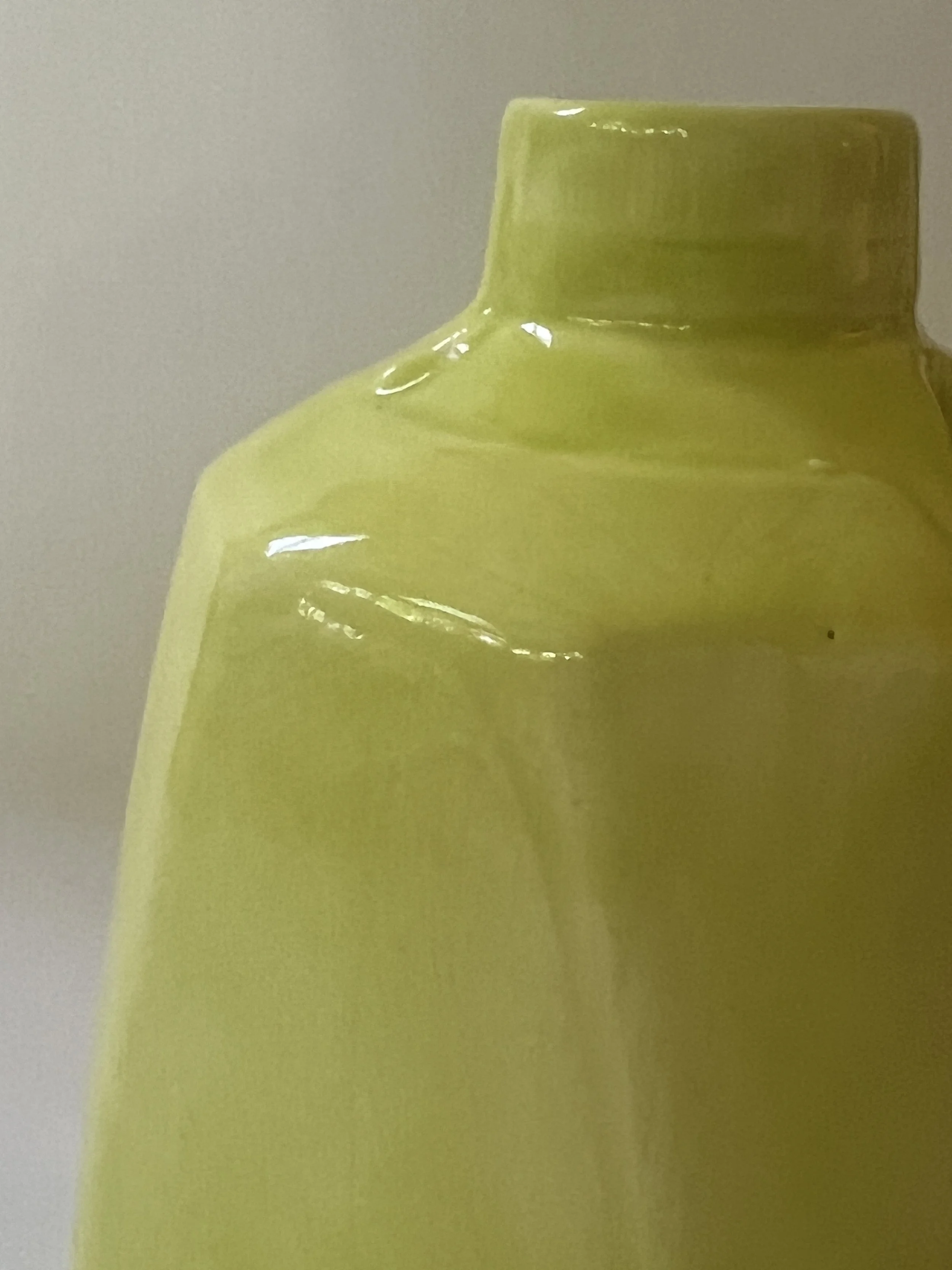 Top-down view of ceramic Pear jug showing circular opening and sculptural geometry.