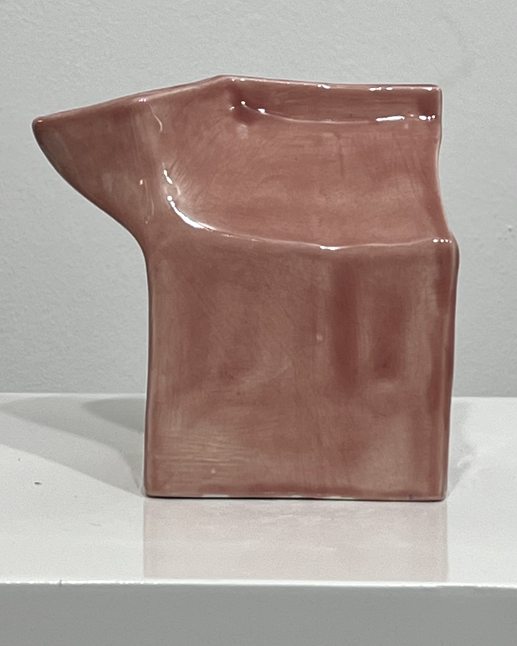 Front view of Milk Carton 26.5, a handmade blush porcelain milk carton sculpture with soft folds and glossy glaze.