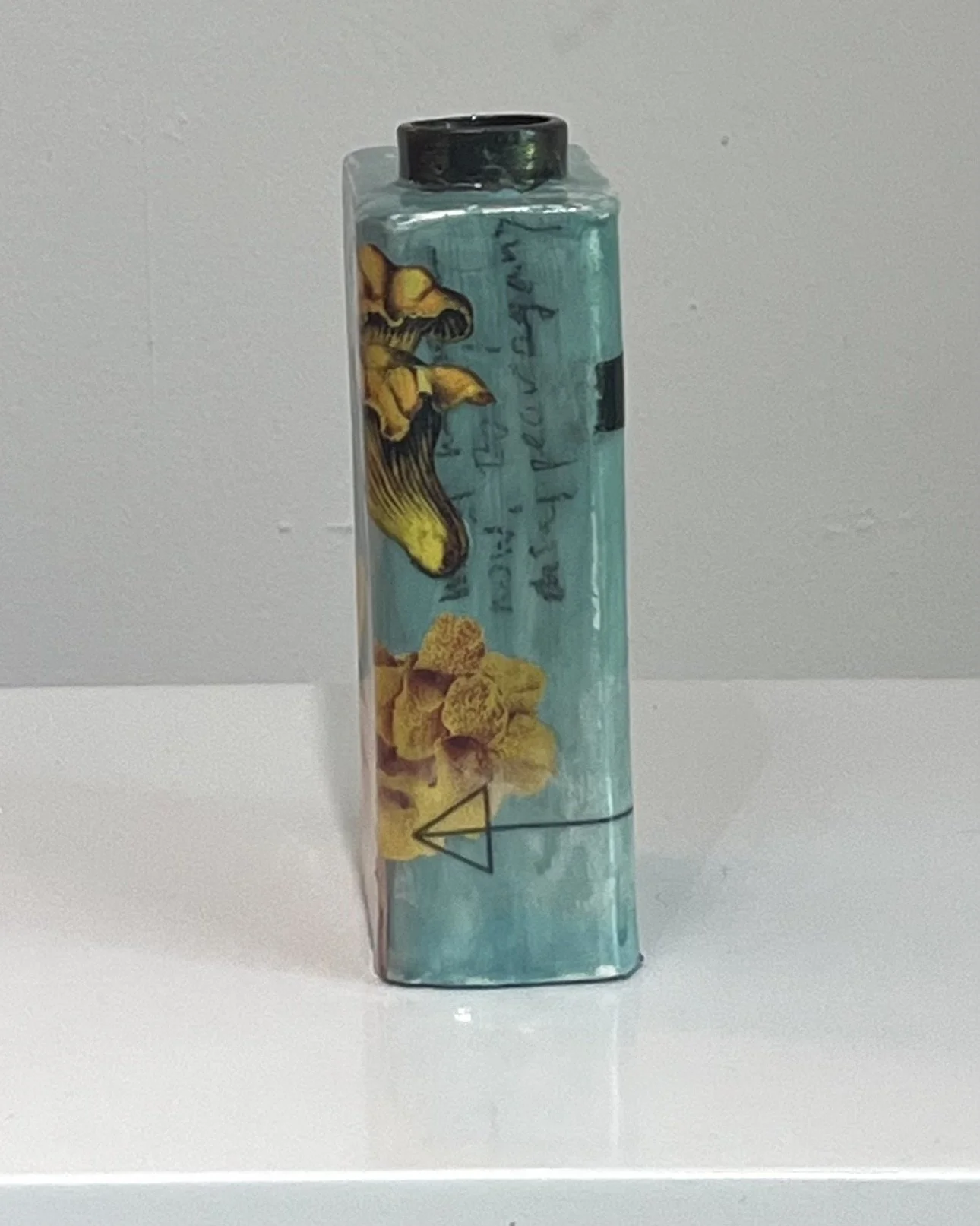 Right side view of First in Flight porcelain Art Carton with contemporary mixed media collage by Alissa Van Atta.