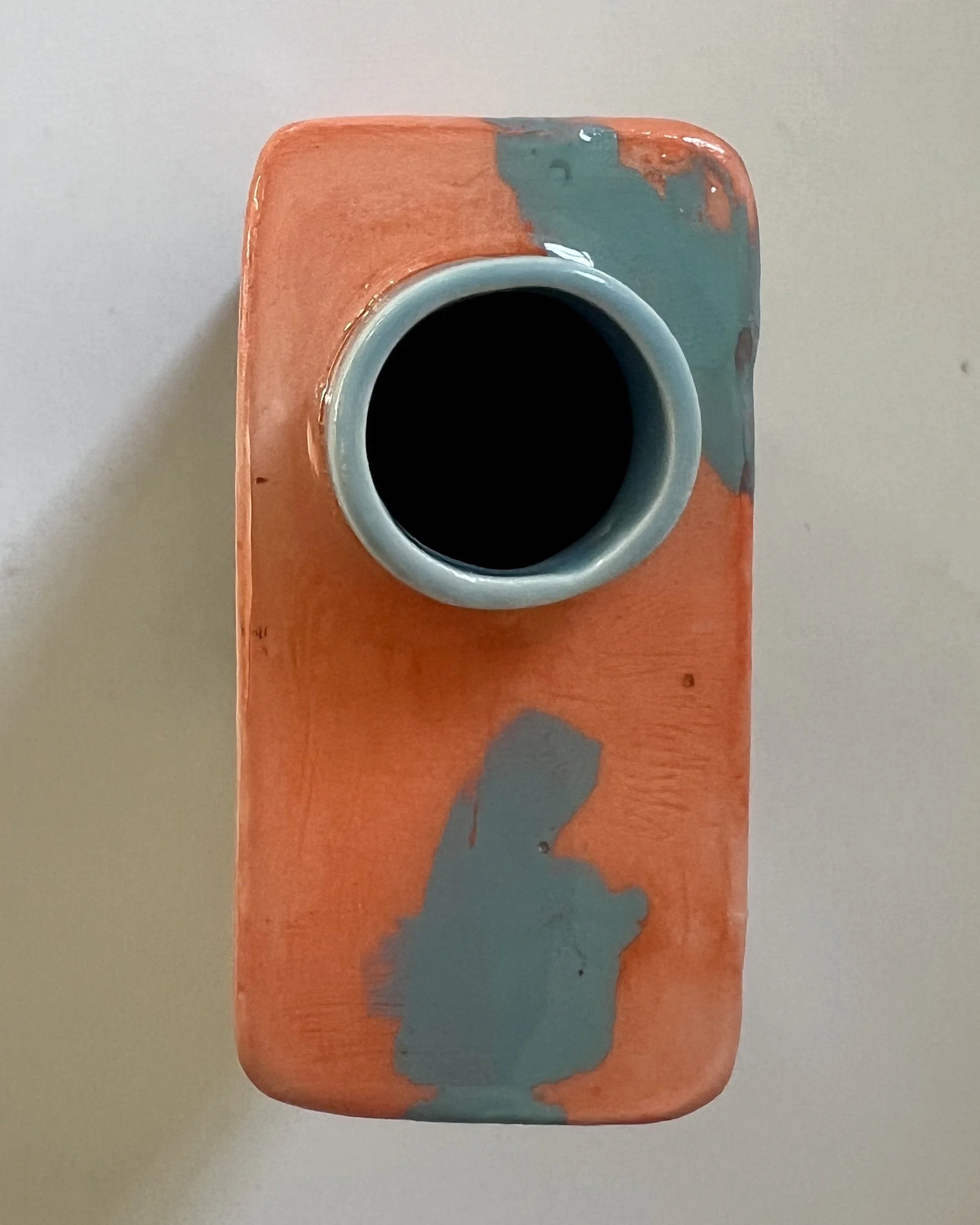 Top view of Time Bomb porcelain Art Carton showing the hand-cast ceramic opening and interior.