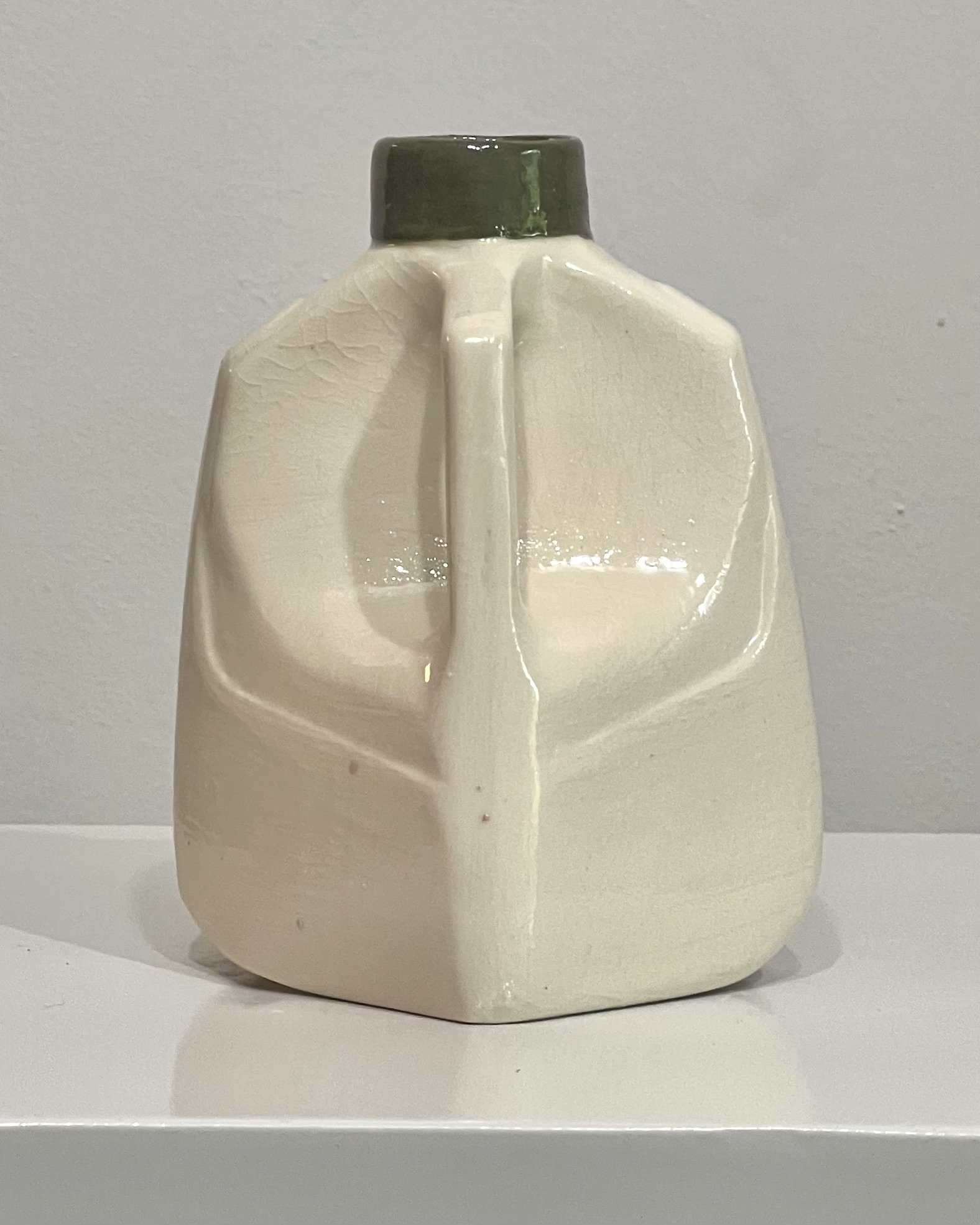Back view of Verdant Sketch porcelain milk jug vase showing the clean form and glossy clear glaze finish.