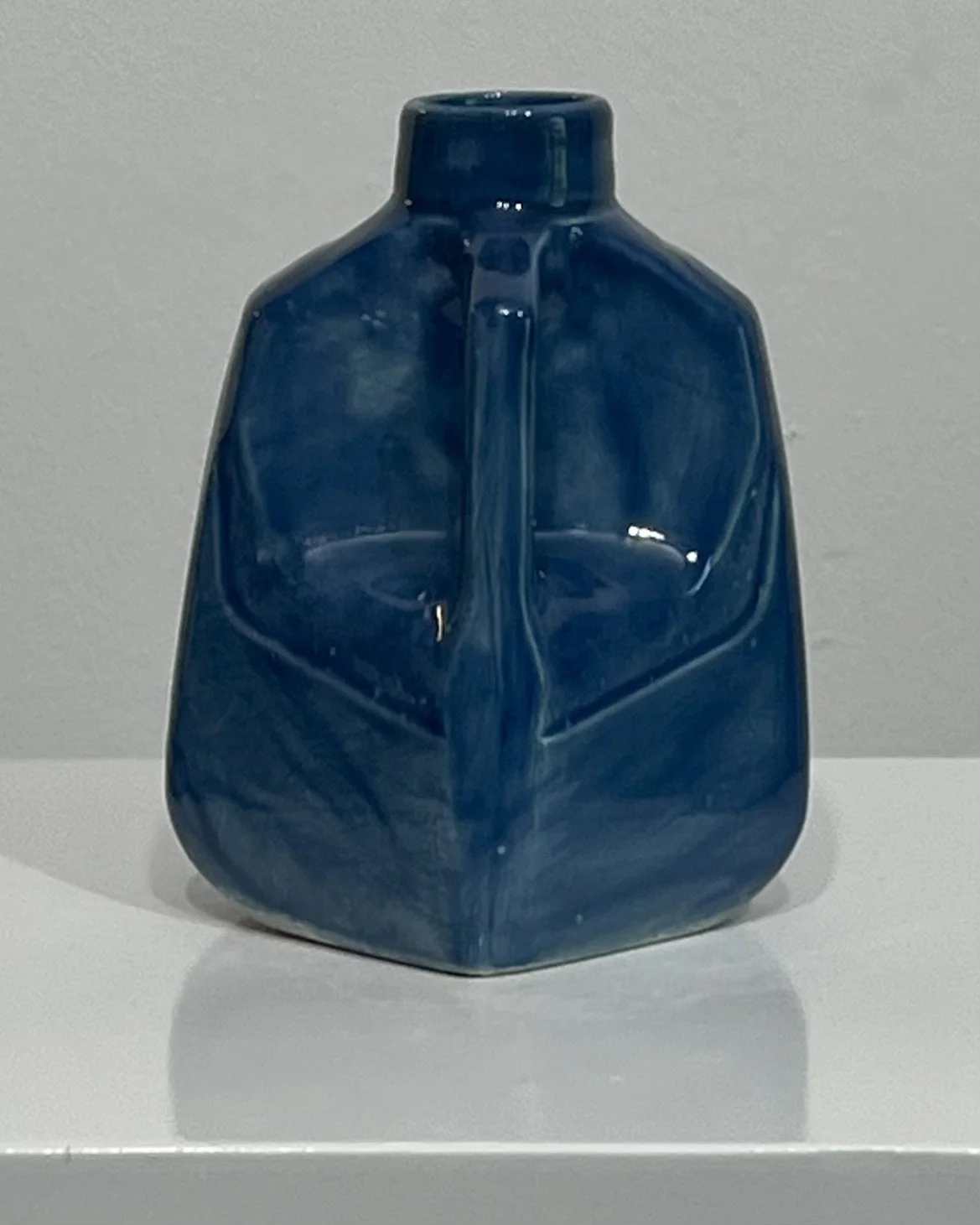 Milk Jug 26.55 Deep Sea glaze angled front view
