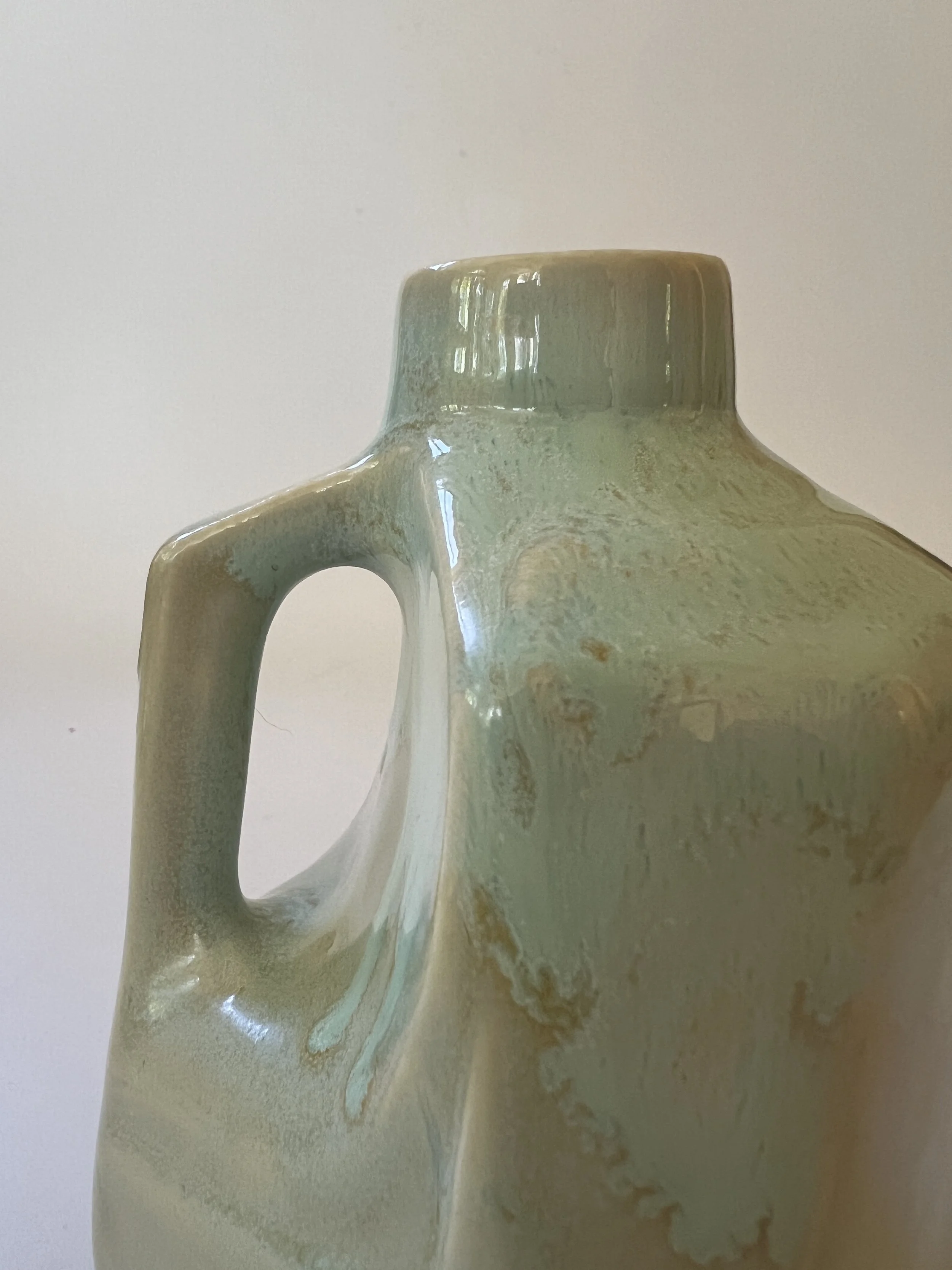 Close-up of layered Sand and Sea glaze with fluid aqua movement