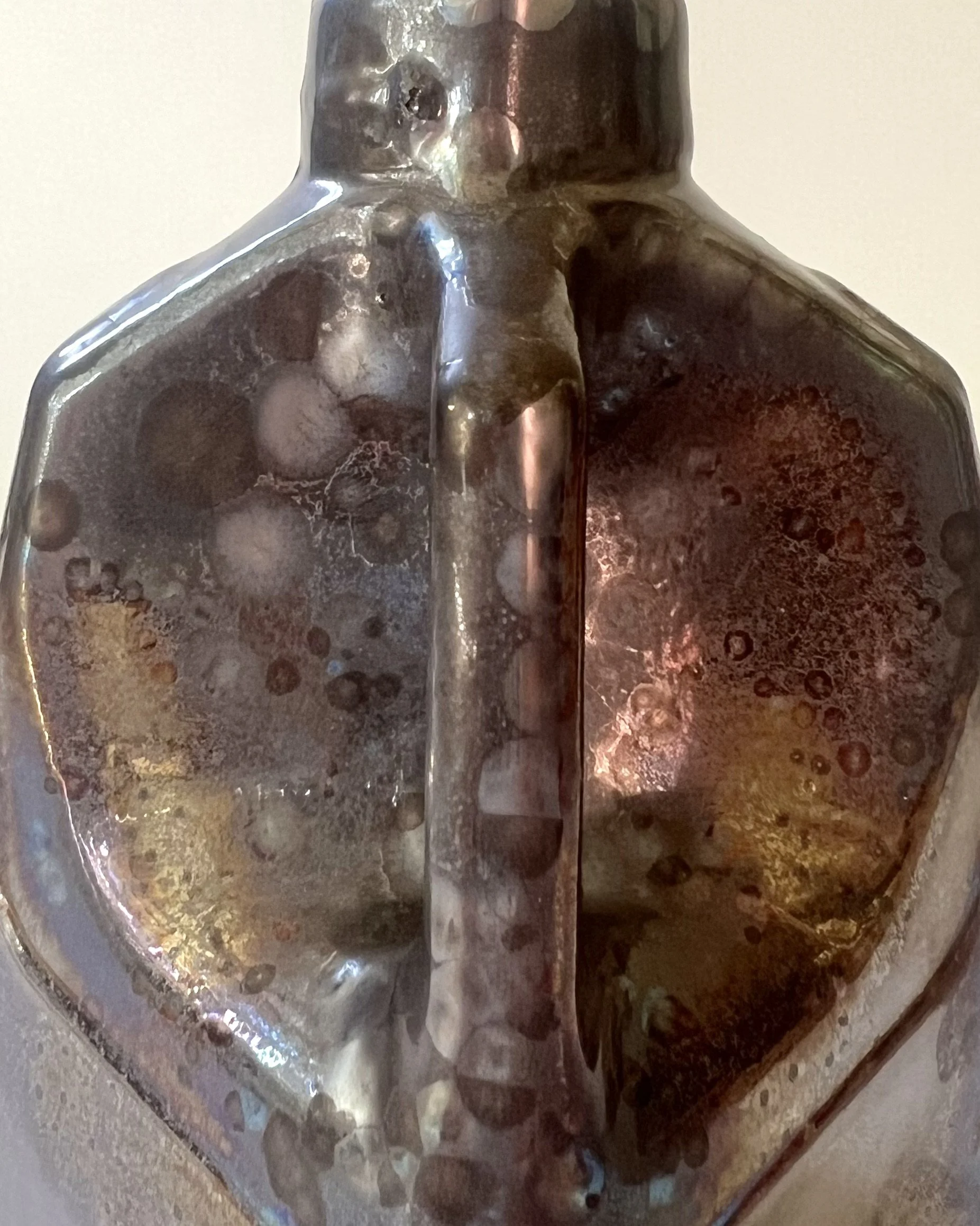 Close-up of metallic Vintage Gold ceramic glaze surface