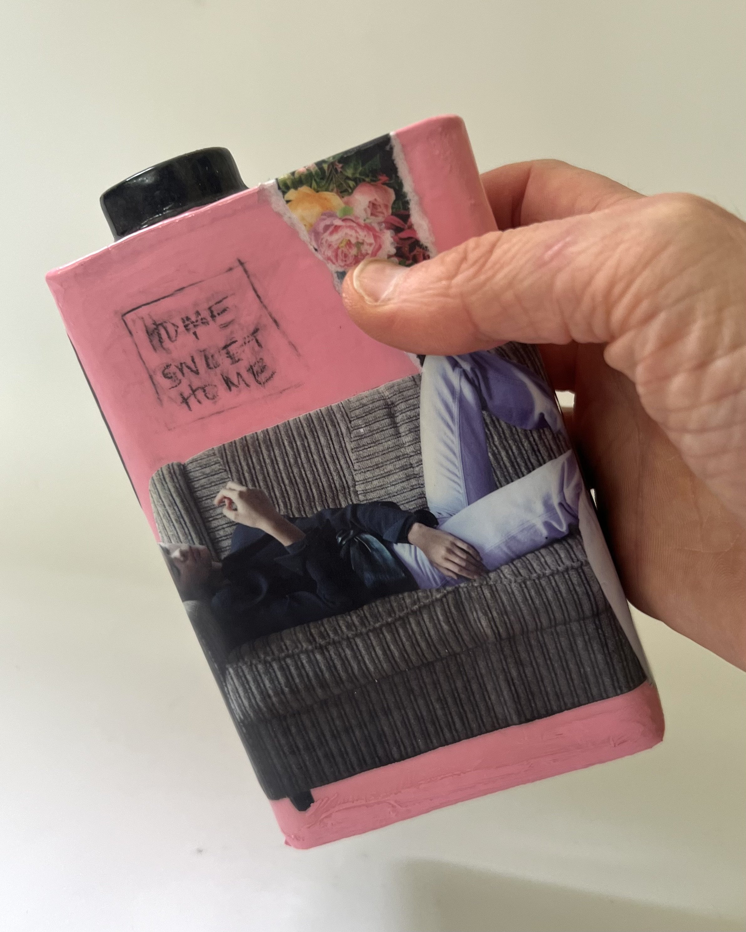 Steeped in Waiting porcelain Art Carton shown in hand for scale, handmade by Asheville artist Alissa Van Atta.