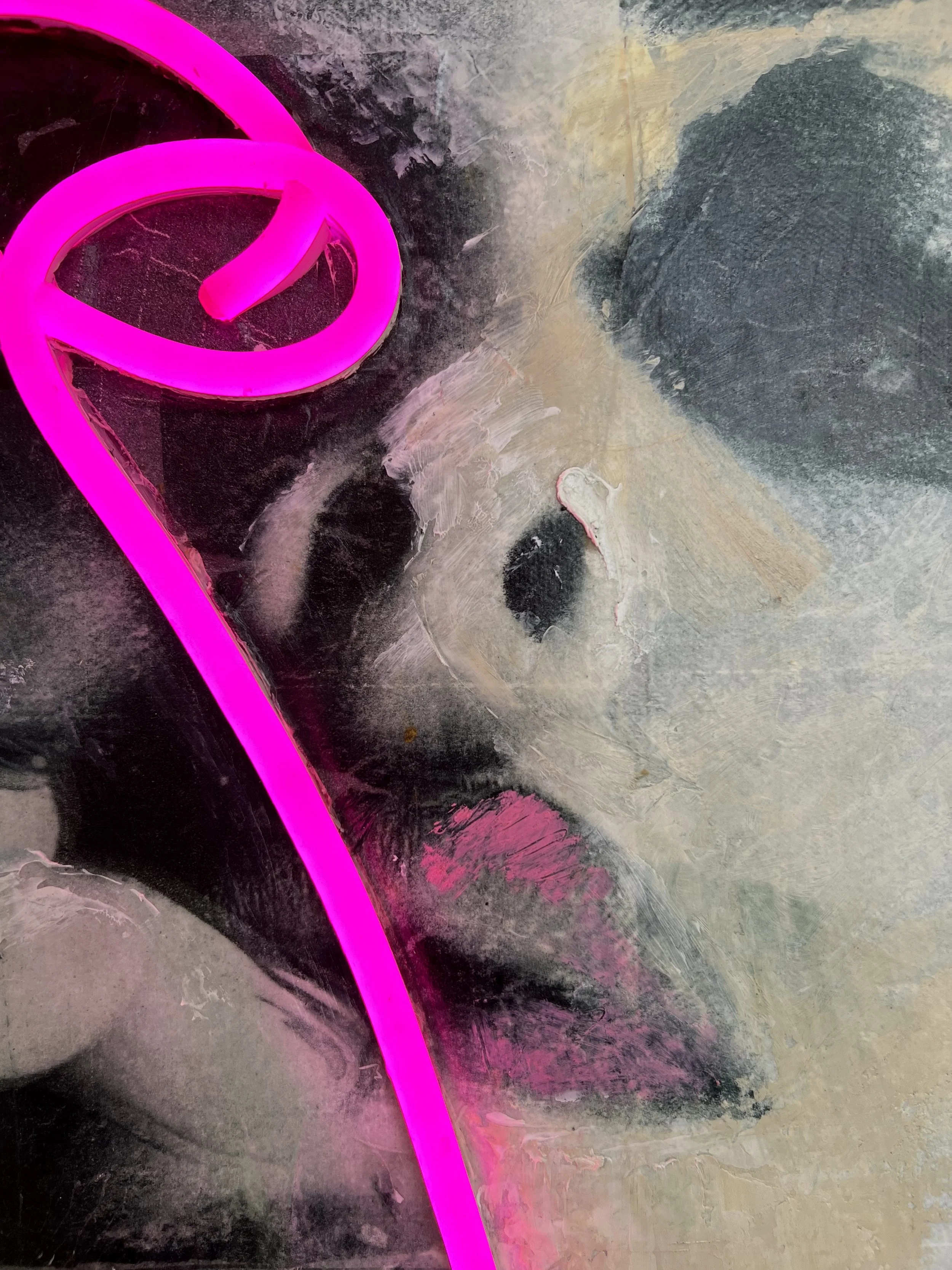 Close-up of Neon Queen by Alissa Van Atta showing the glowing pink neon element over the woman's eye and the surrounding richly textured cold wax painting.
