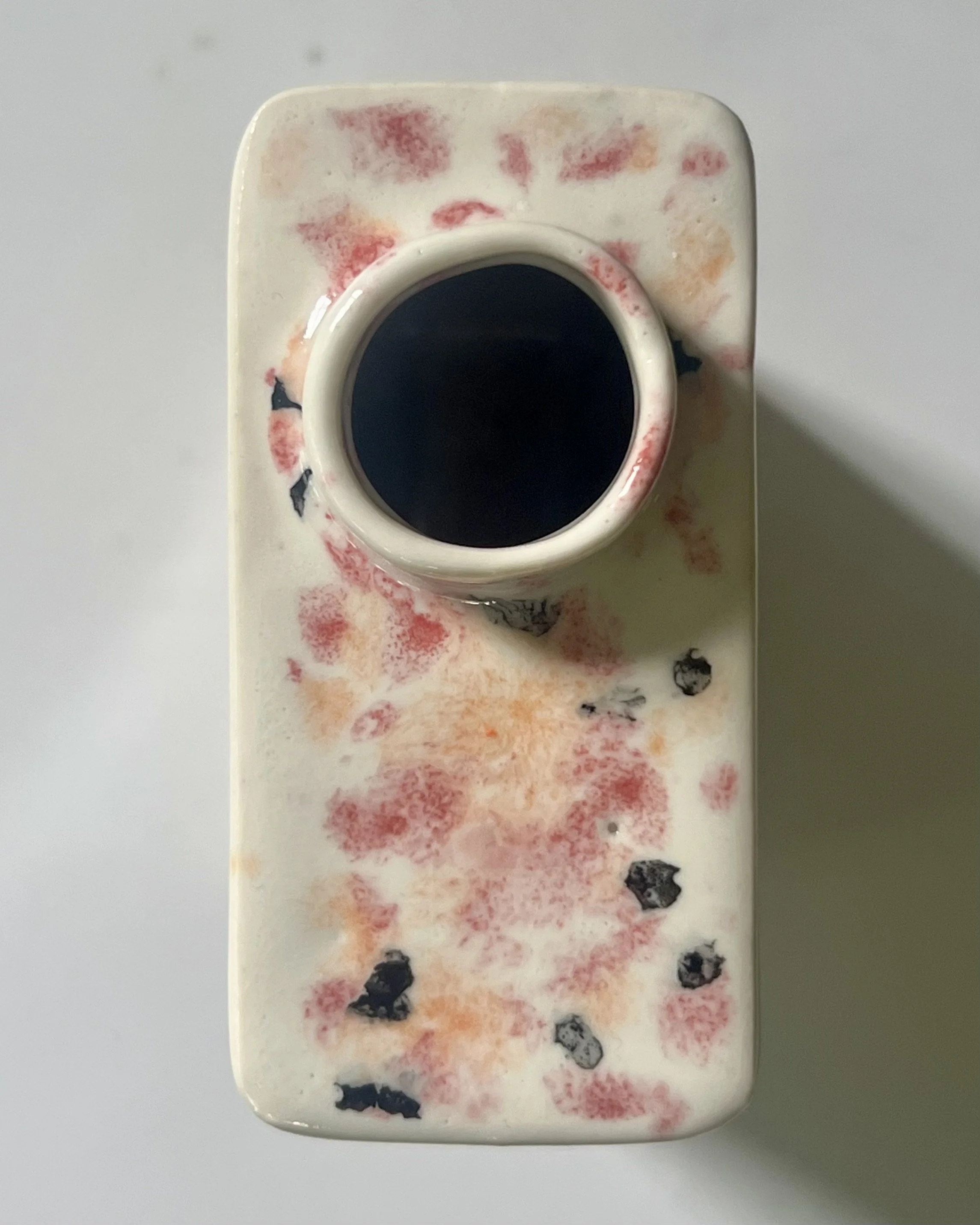 Top view of Poppy Fields porcelain carton vase C26.6 showing the circular opening and speckled cream glaze.