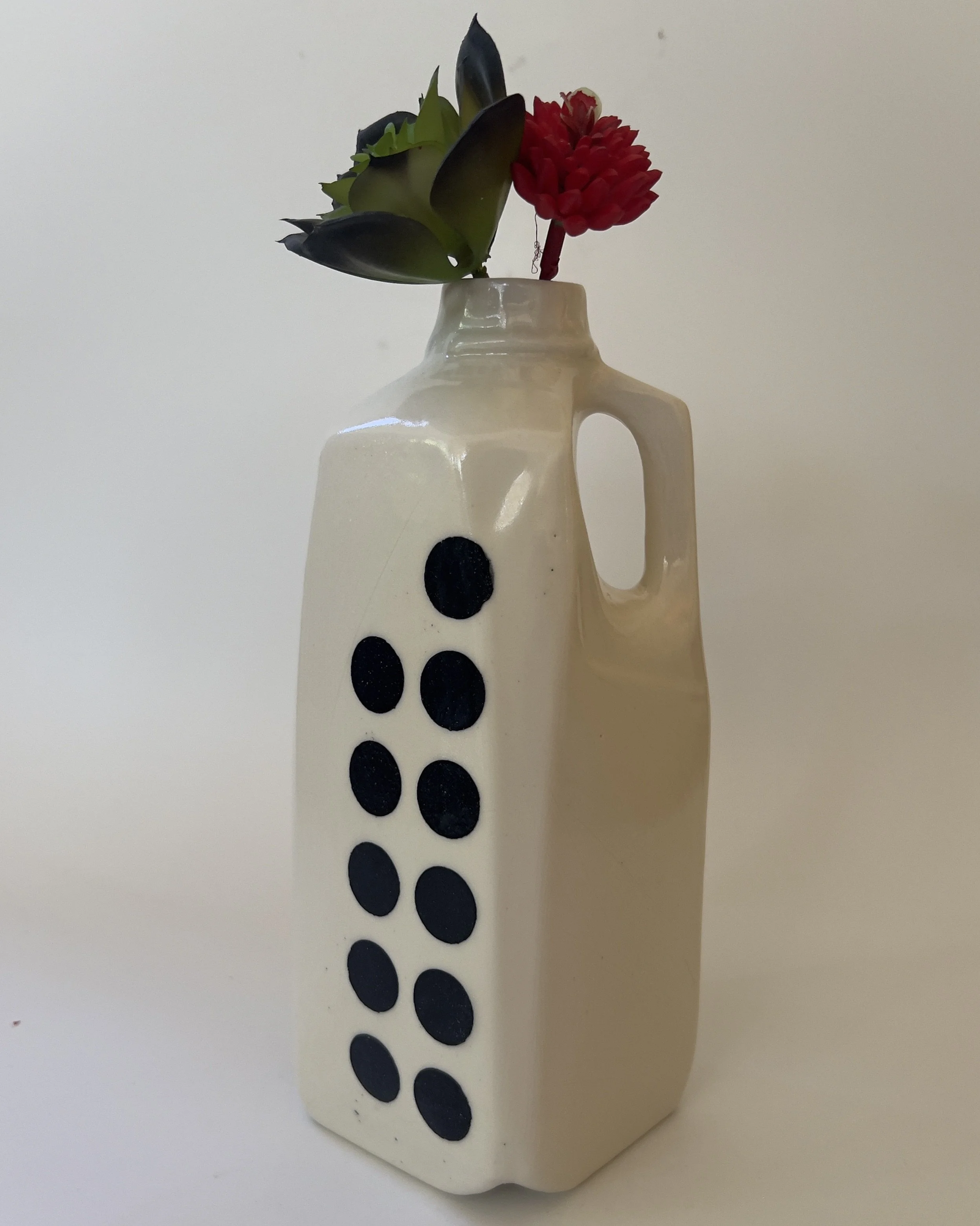 Handmade white ceramic tall jug vase with glossy black dots and sculptural handle by Alissa Van Atta
