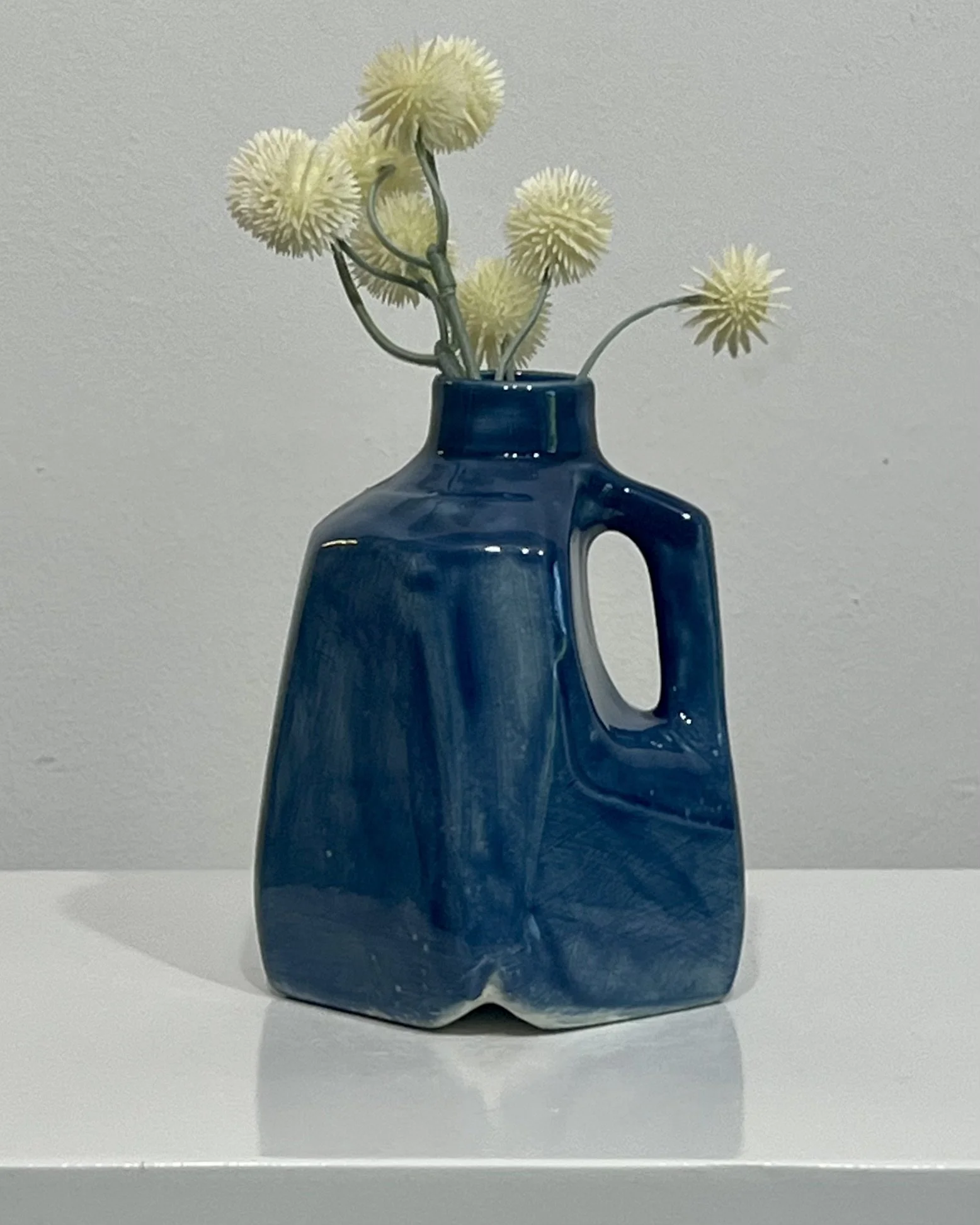 Milk Jug 26.55 in Deep Sea glaze with flowers by Alissa Van Atta