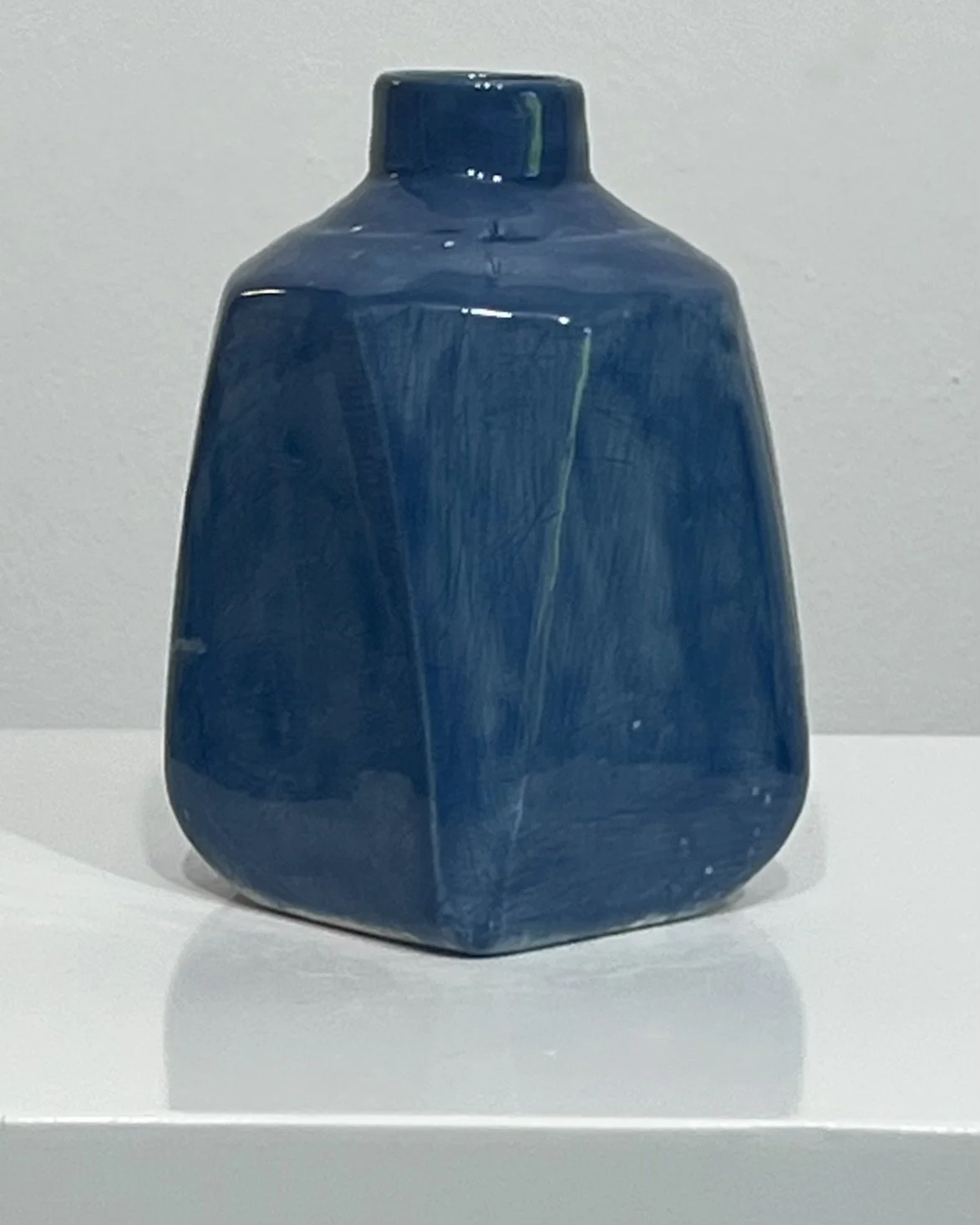Back view of Milk Jug 26.55 in Deep Sea glaze