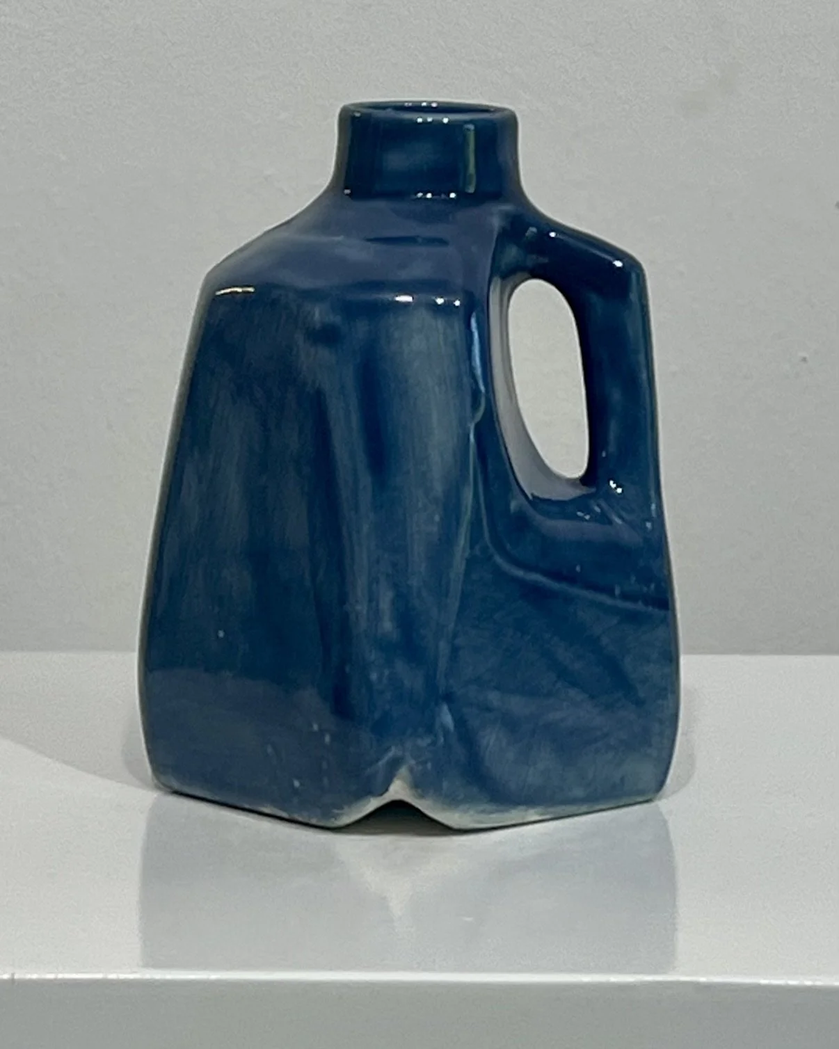 Handmade porcelain milk jug 26.55 in Deep Sea glaze front view
