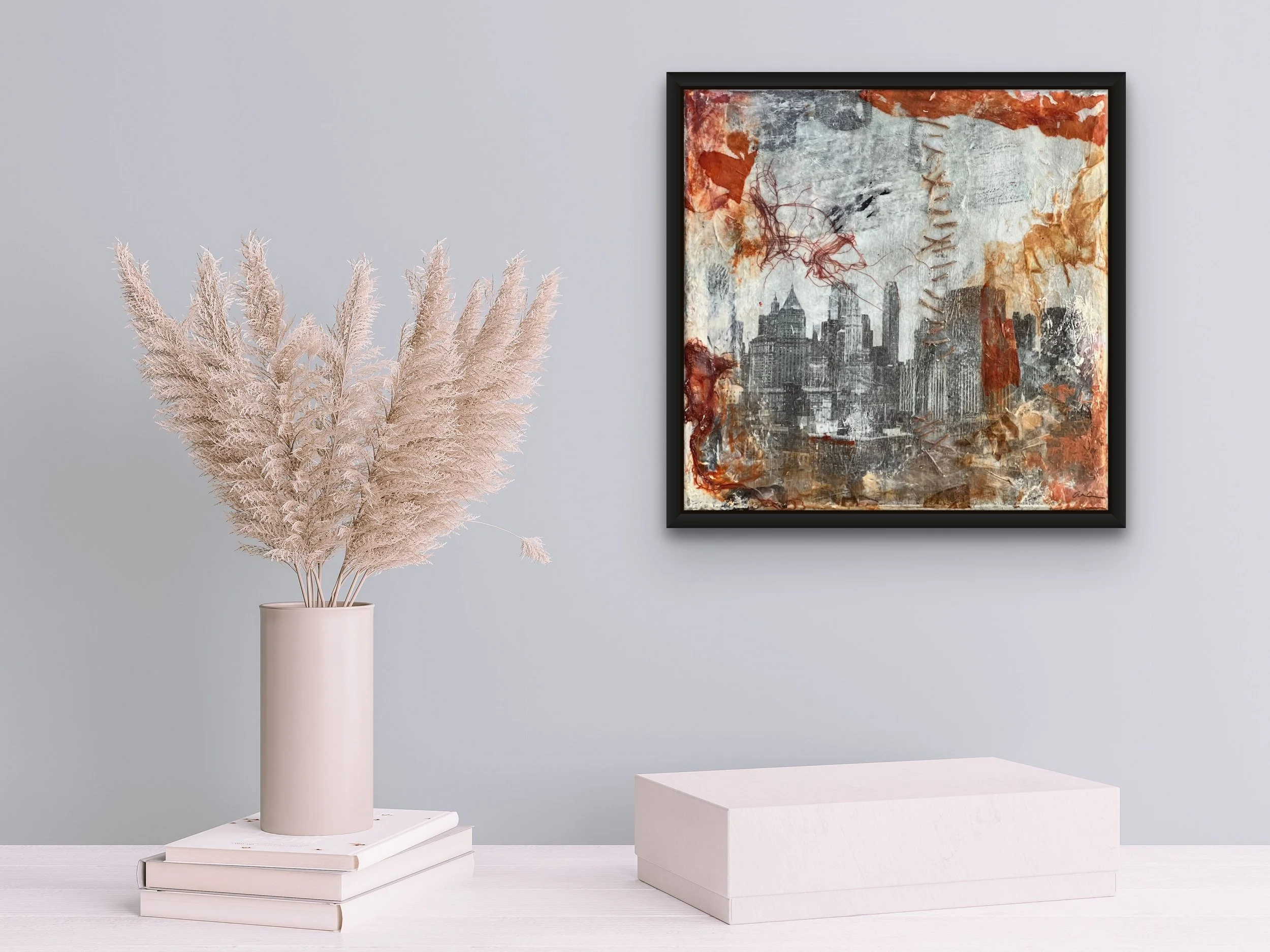 View from Here, an original framed 12 by 12 inch New York City mixed media artwork by Alissa Van Atta, displayed on a wall in a contemporary interior.