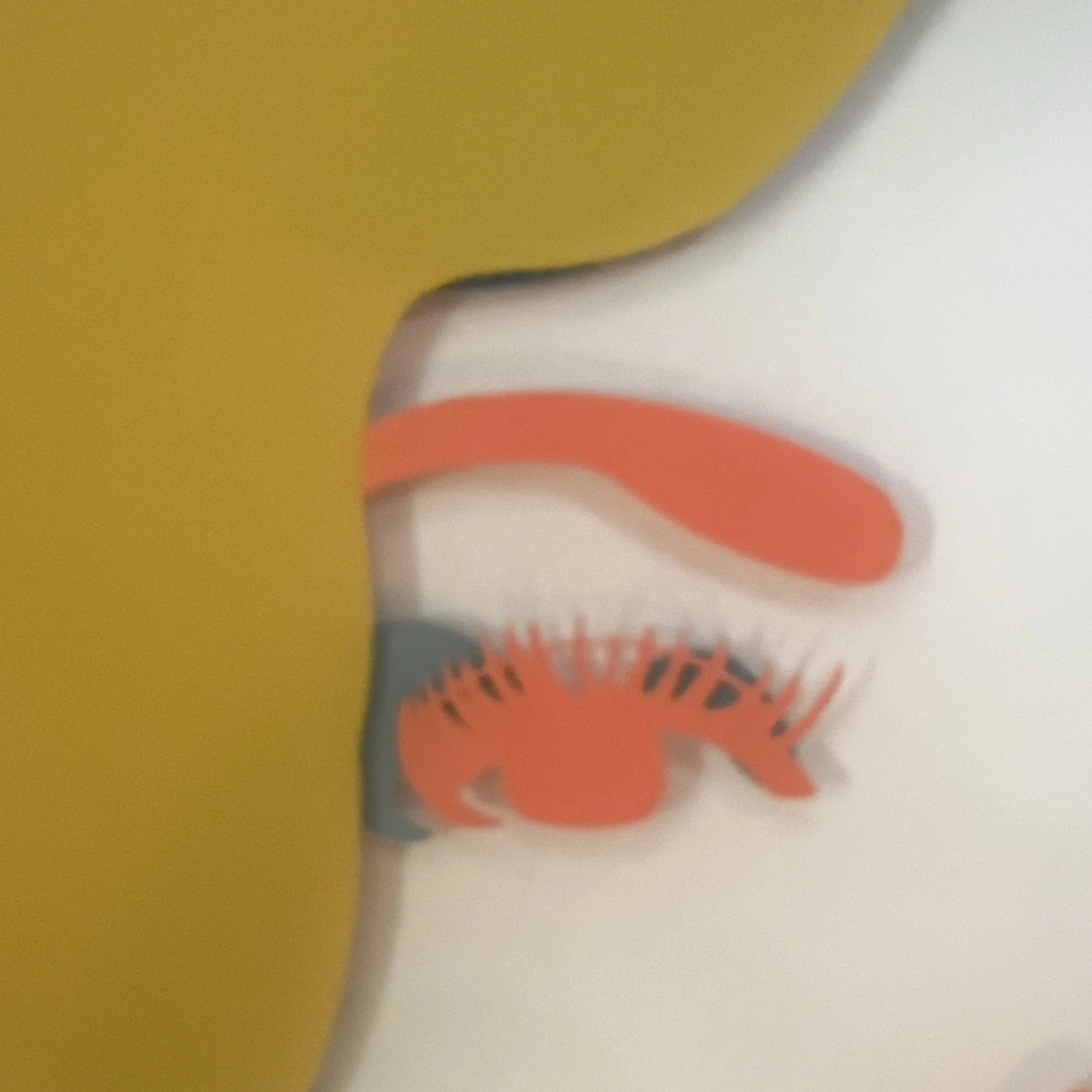 Close-up of Chloe showing dimensional yellow hair, coral eyes, and layered resin facial elements