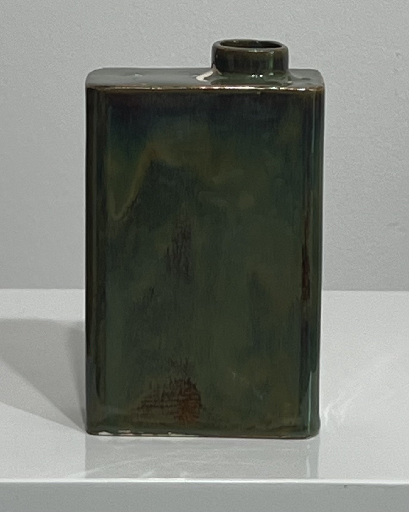 Back view of handmade Mood Ring ceramic carton vase