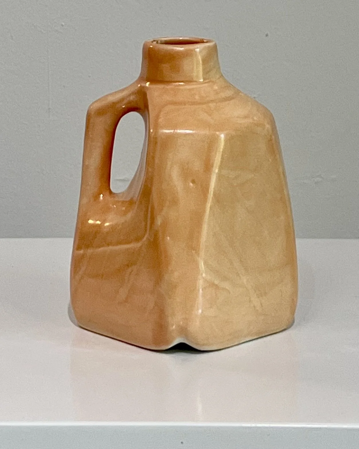Opposite side of Milk Jug 26.53 with Snow Drift over Tangelo glaze
