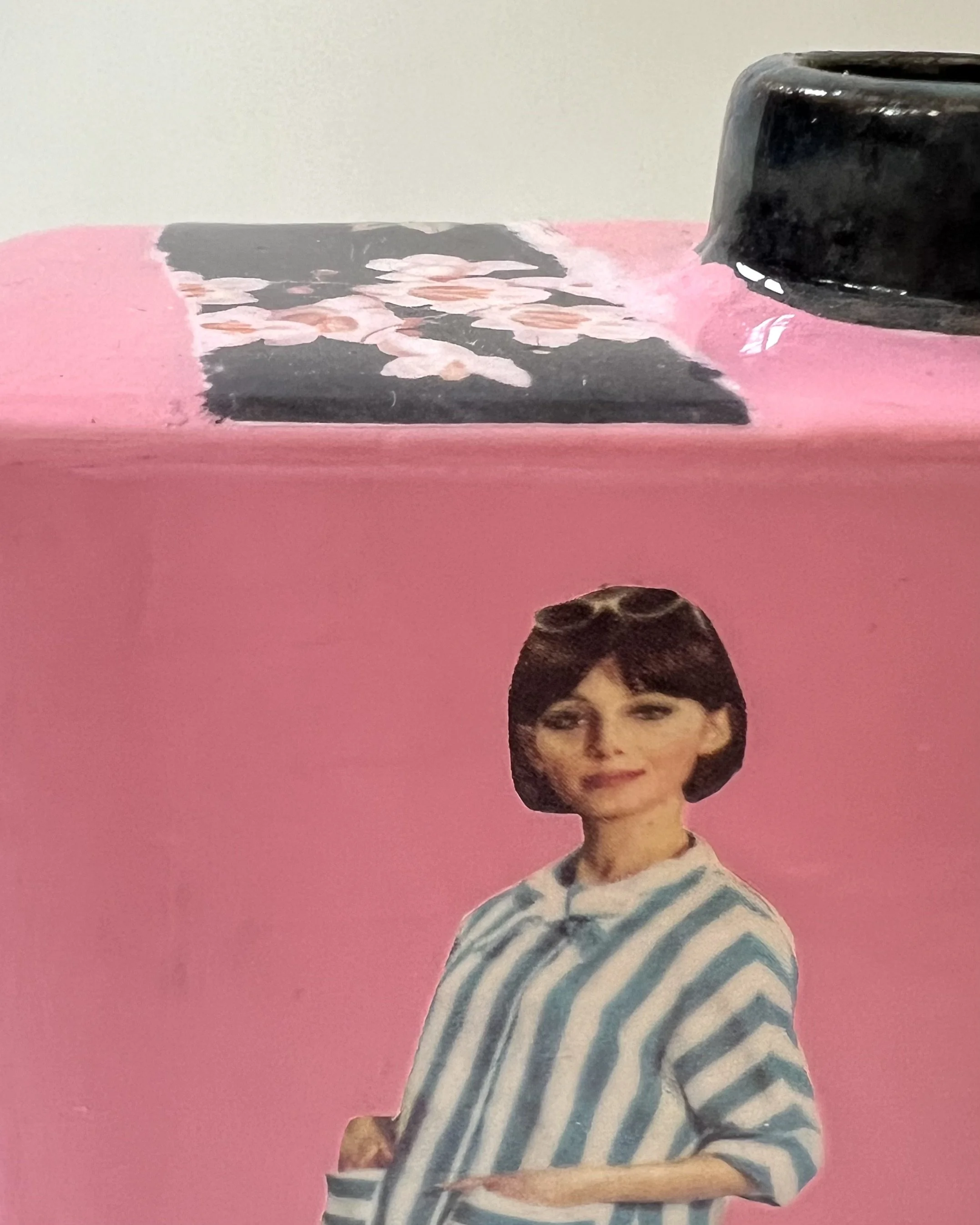 Detail of Steeped in Waiting highlighting layered collage imagery, acrylic, and resin on porcelain.