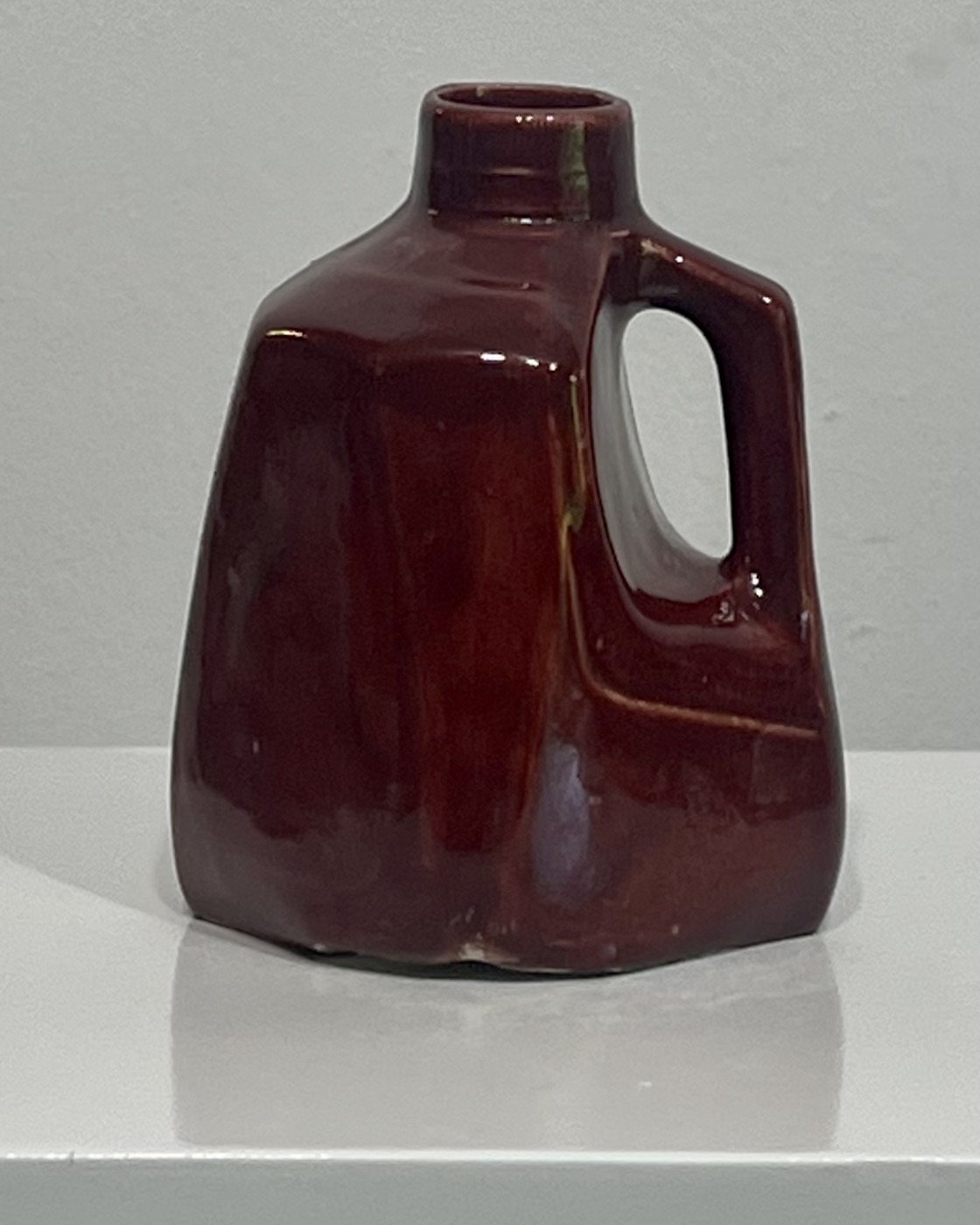 26.51 Deep Firebrick handmade porcelain milk jug vase, front view