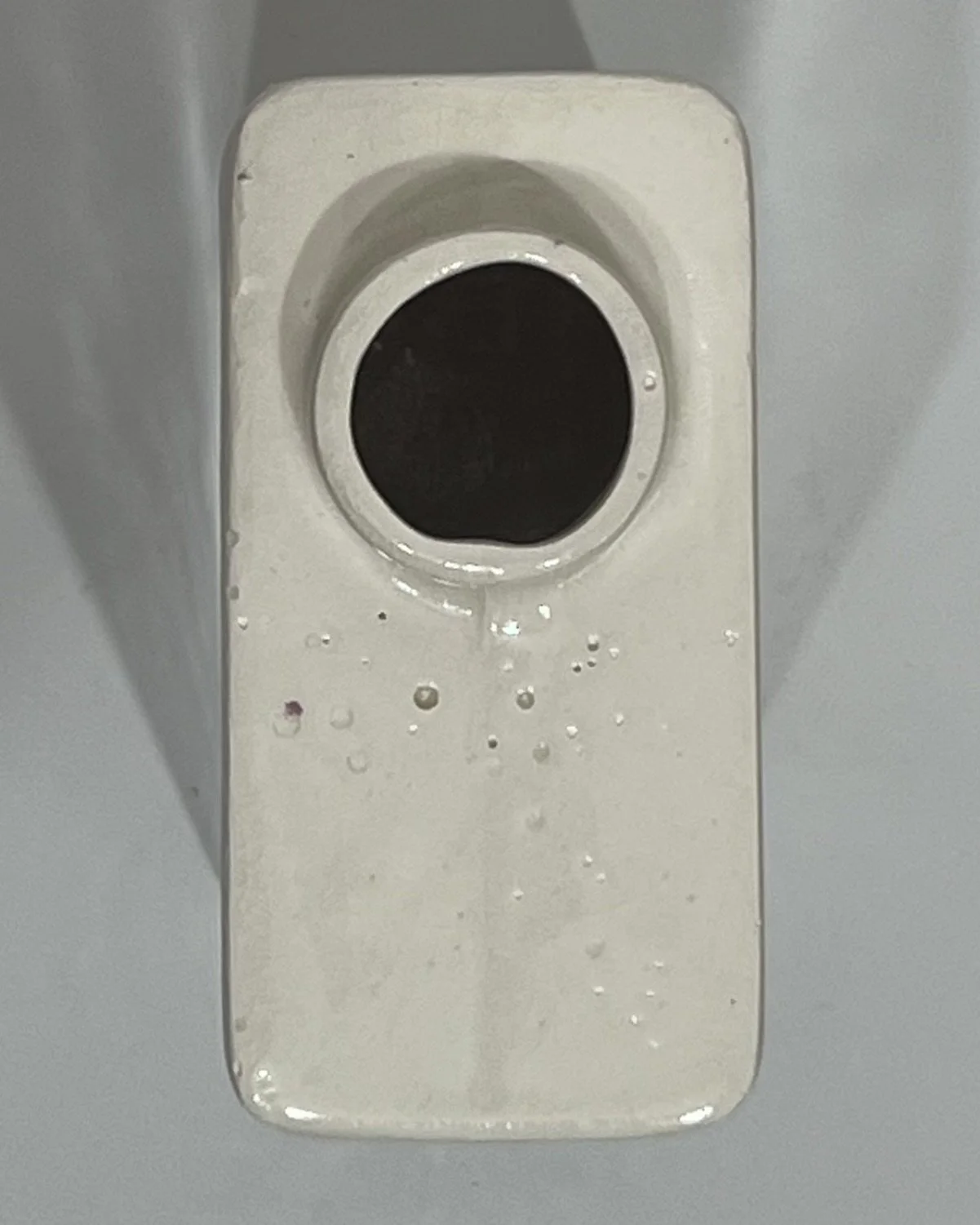 Top opening of handmade porcelain carton vase