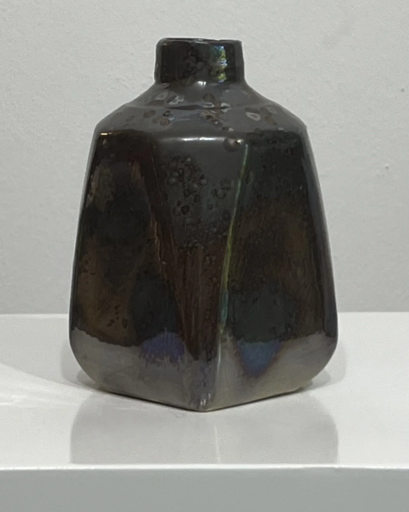 Back view of porcelain milk jug vase in Vintage Gold glaze